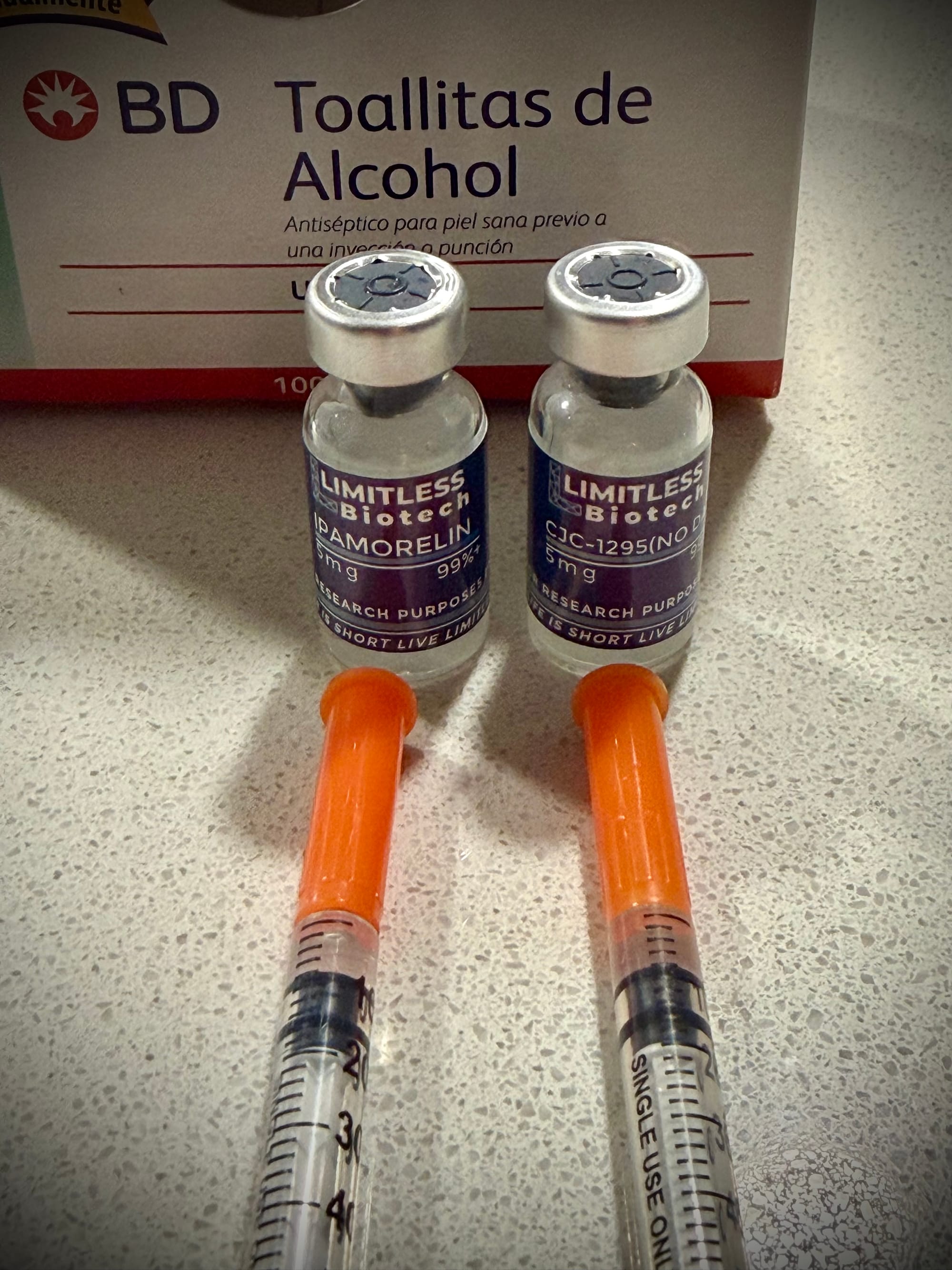 CJC-1295 and Ipamorelin vials with two prepped insulin syringes