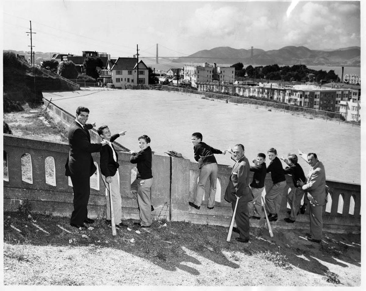 men and boys pointing