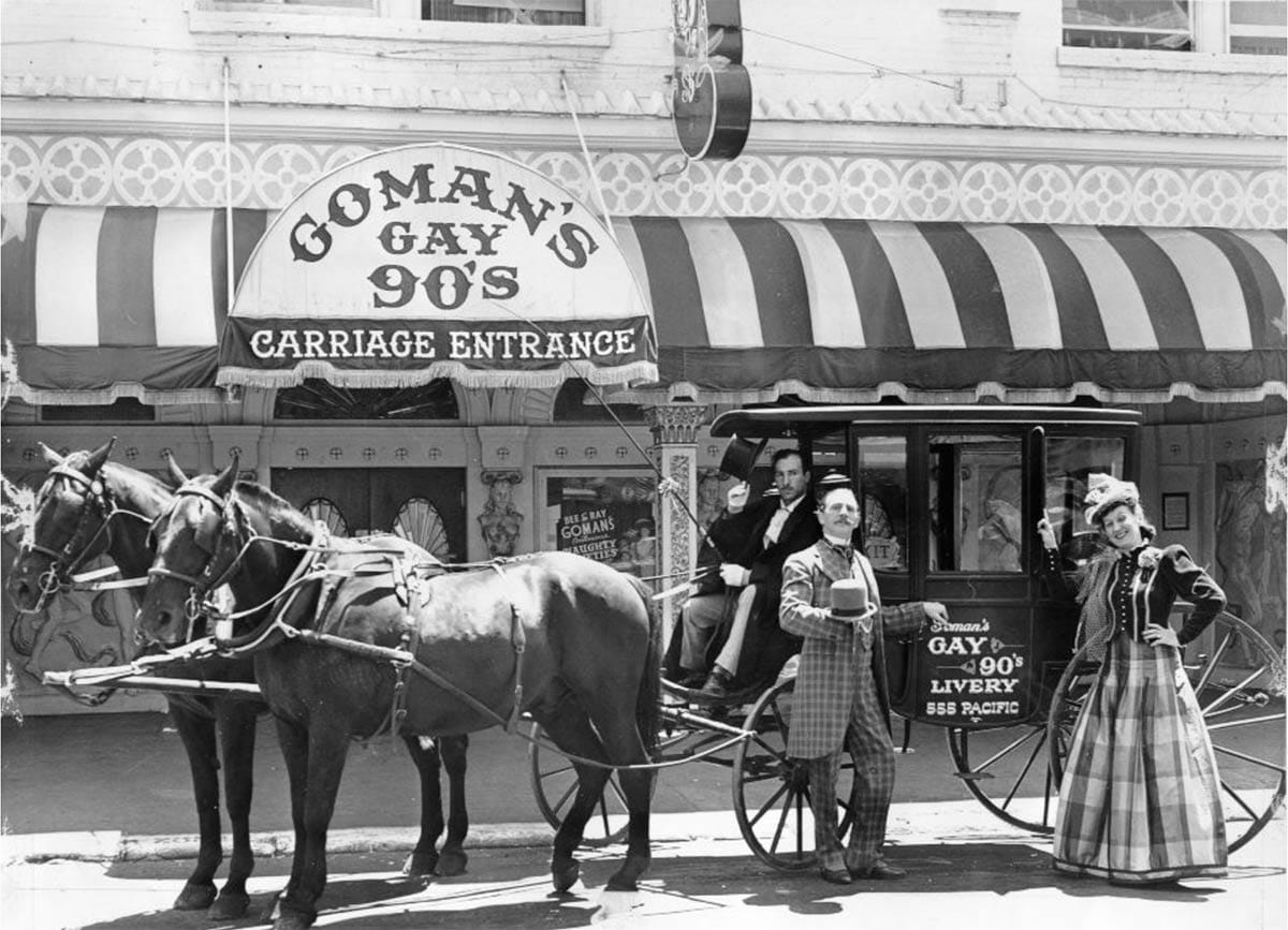 horse, carriage in front of 1940s nightclub