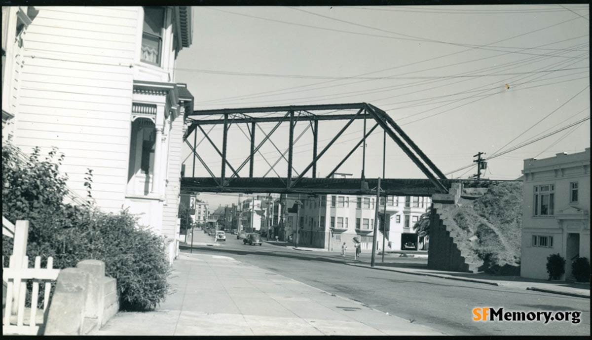 View east on 27th Street at Dolores Street bridge