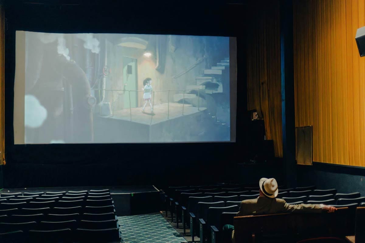 Woody watching movie at Balboa Theatre