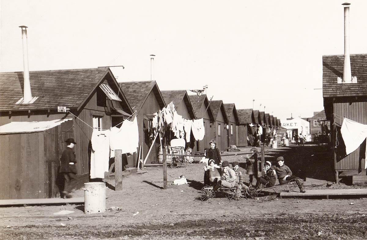 Children in earthquake cottage camp