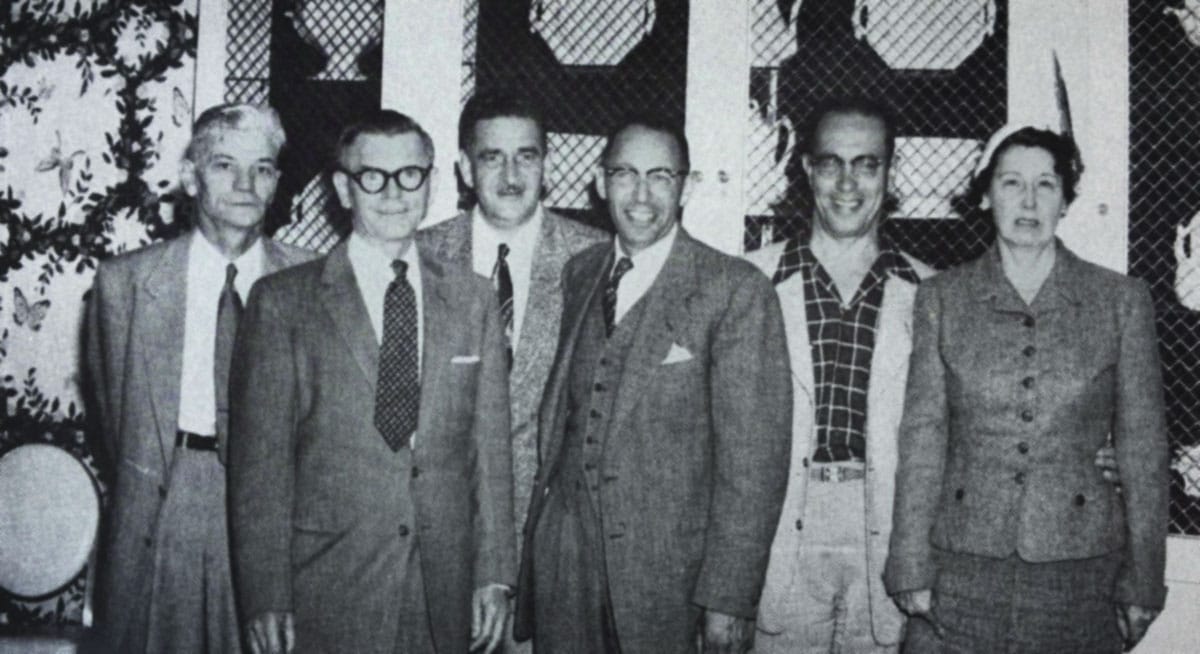 Albert Wilson, center, with fellow alumni of the Nursery for Homeless Children in 1956.