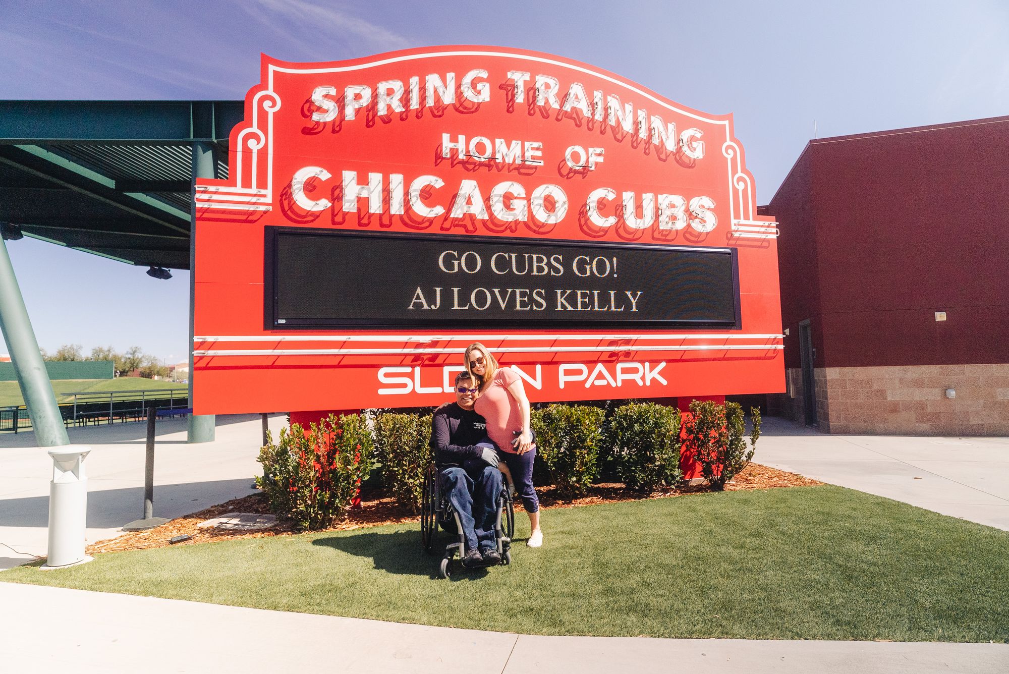 Wheelchair user and wife at Chicago Cubs Spring training in Mesa