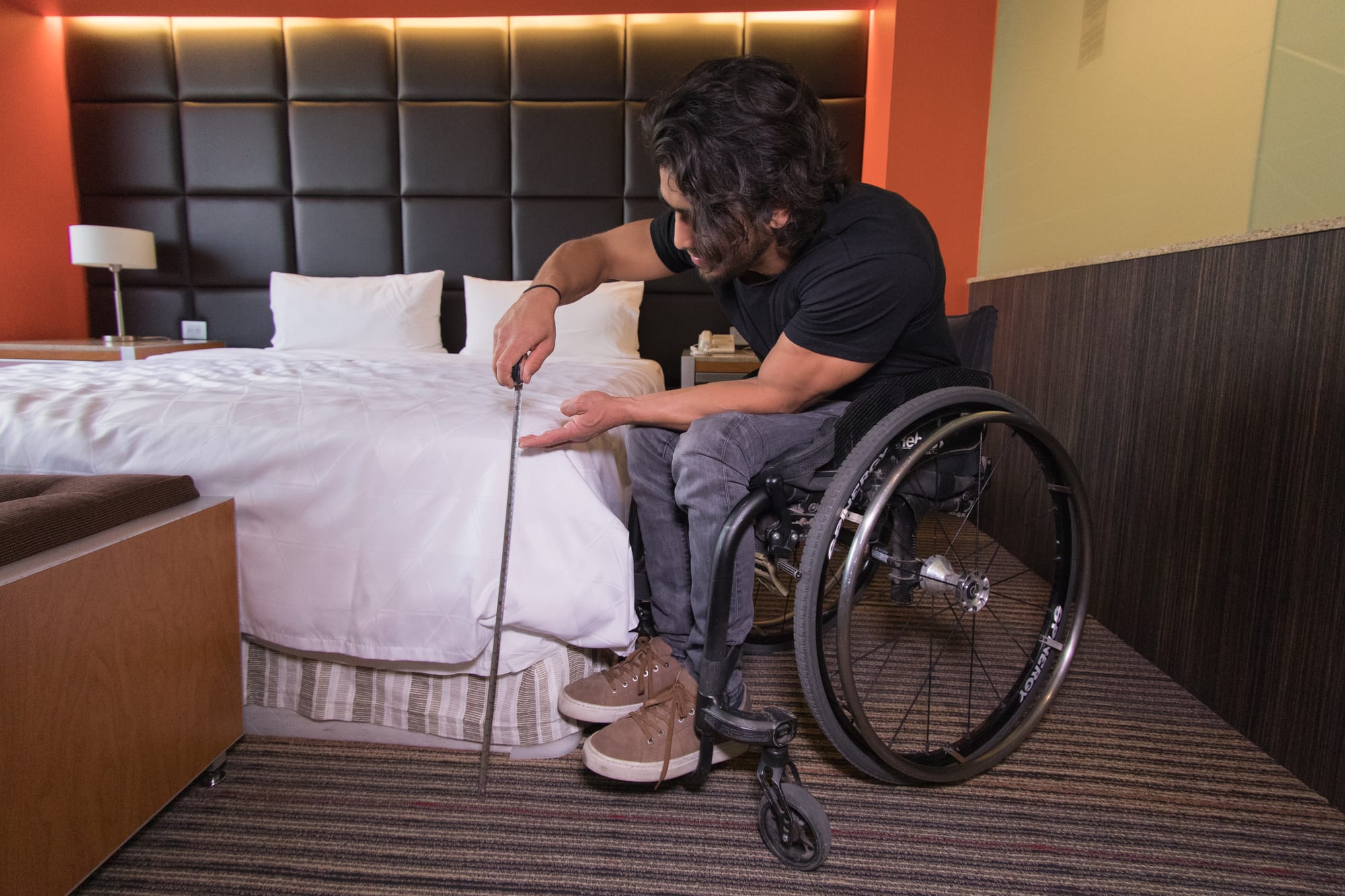 Wheel the World mapper taking measurements of the bed height. This ensures for reliable and accurate information on accessibility.