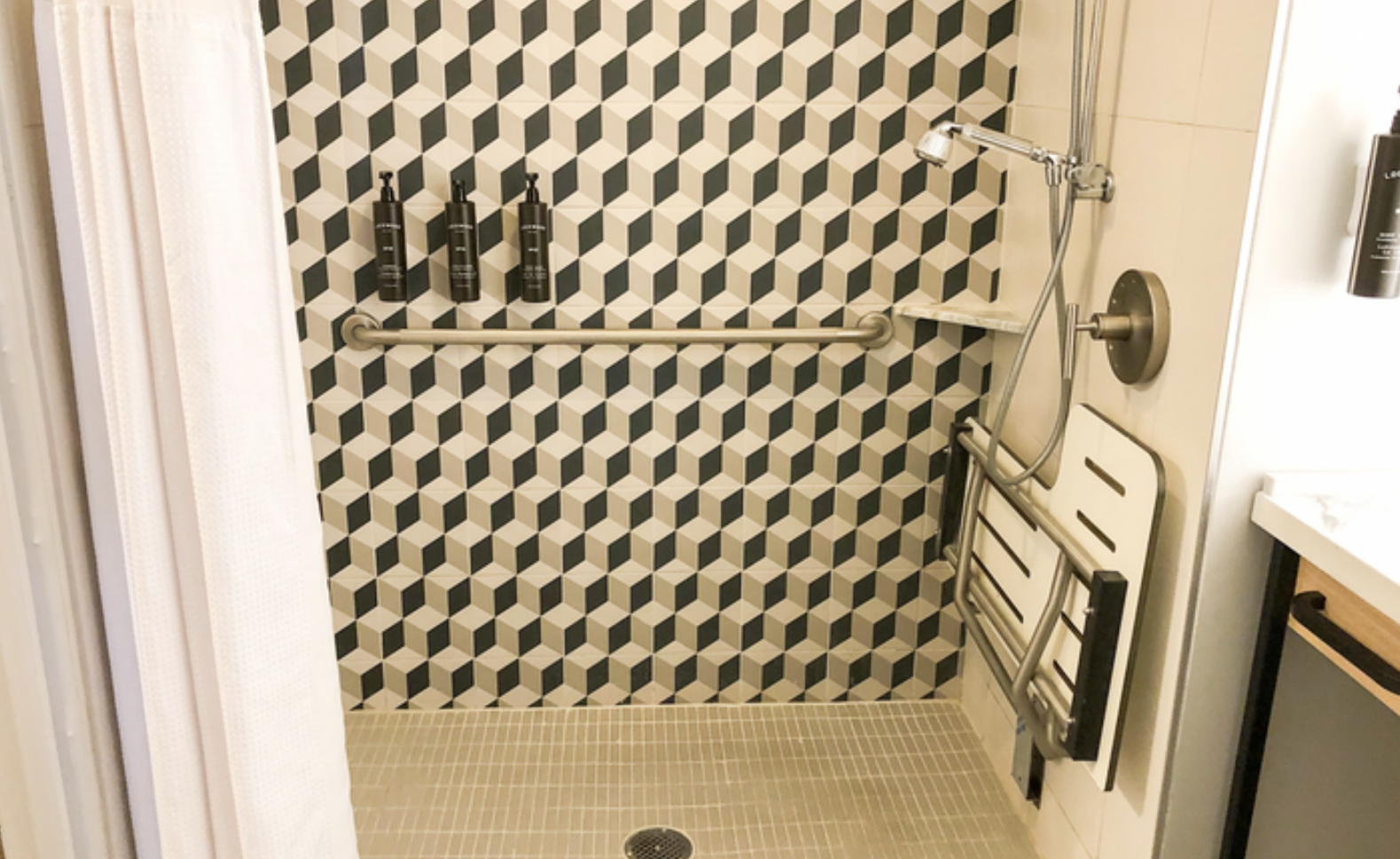 Roll-in shower with a seat at The Duniway Portland