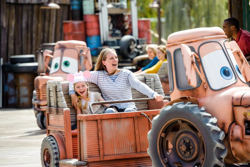 Mom and daughter enjoying a ride at Disneyland Park