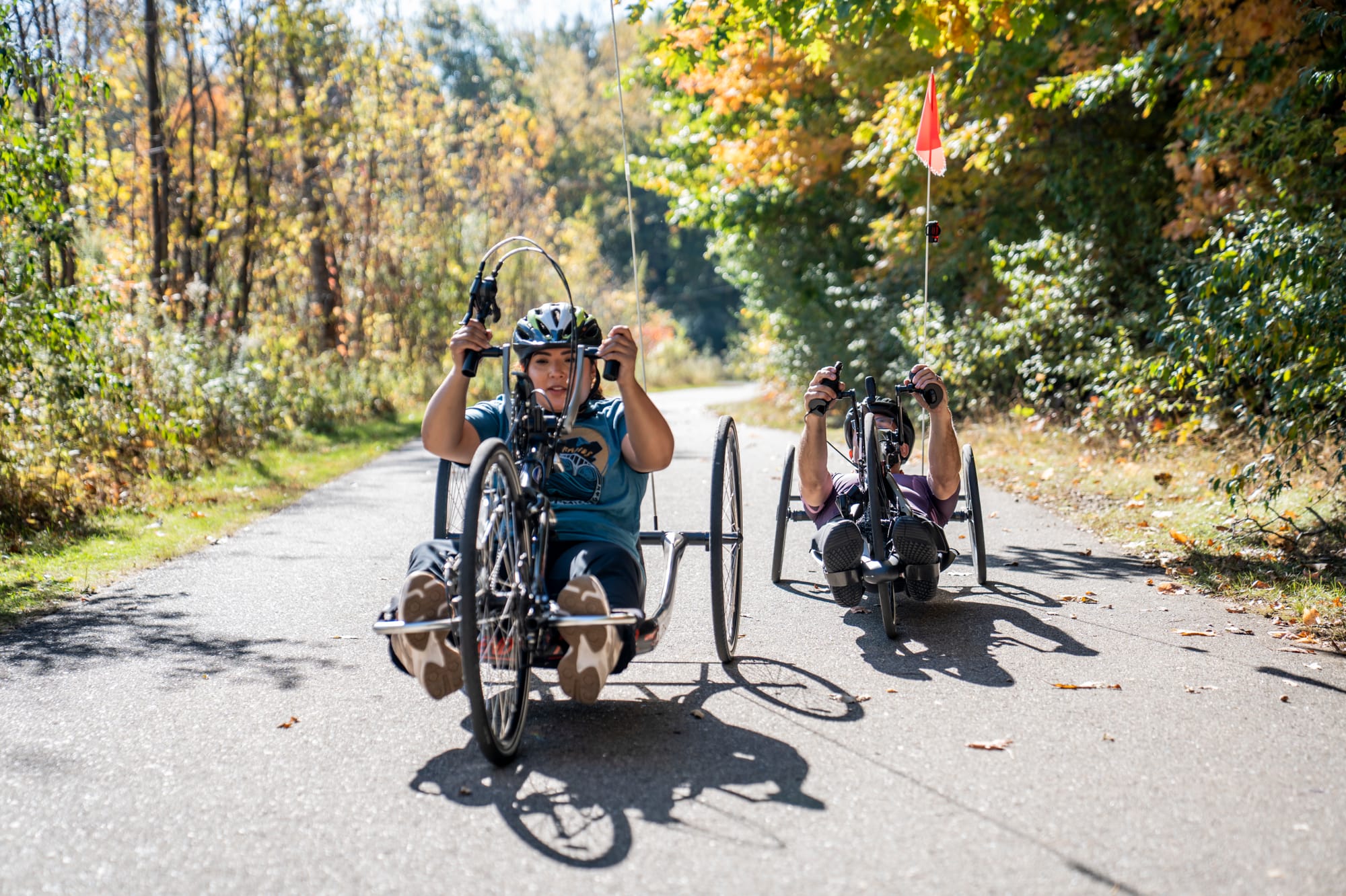 Woman enjoying adaptive cycling on accessible trails in Grand Rapids, Michigan