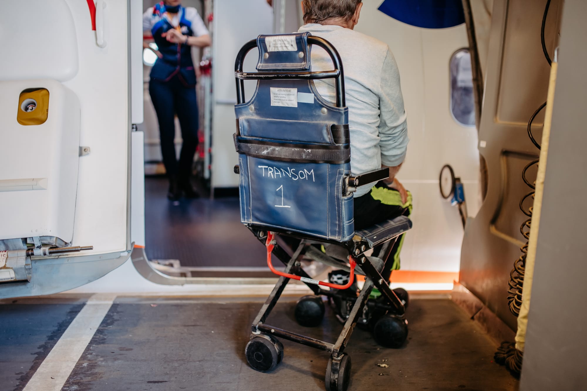 Boarding the airplane with an aisle wheelchair