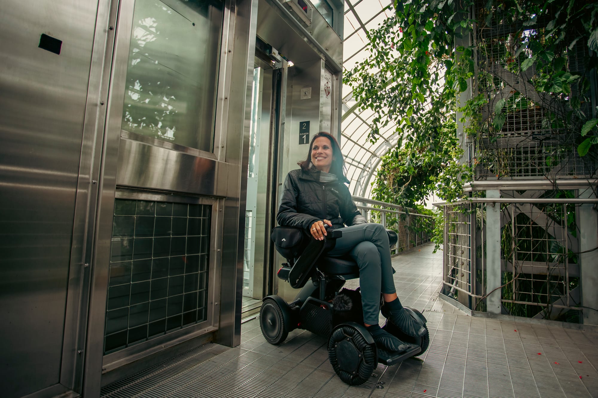 Wheelchair user enjoying the elevator to the top of U.S Botanic Garden in Washington DC