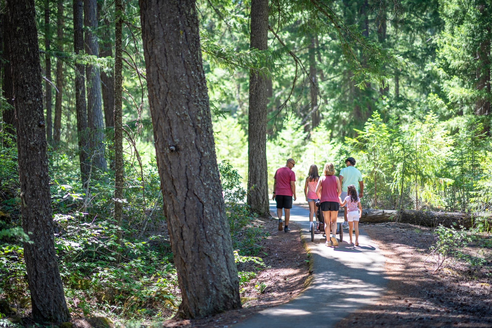 Family walking on local trails in Medford, Oregon