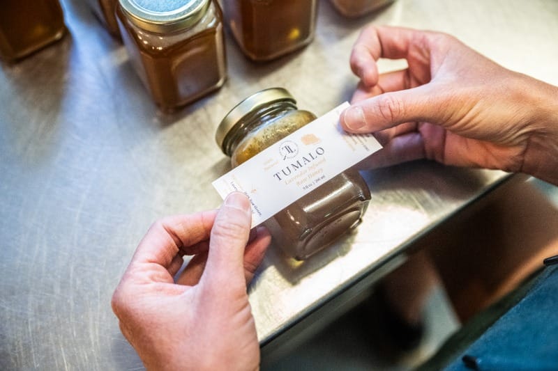 Putting a Tumalo Lavender logo over a jar of their honey