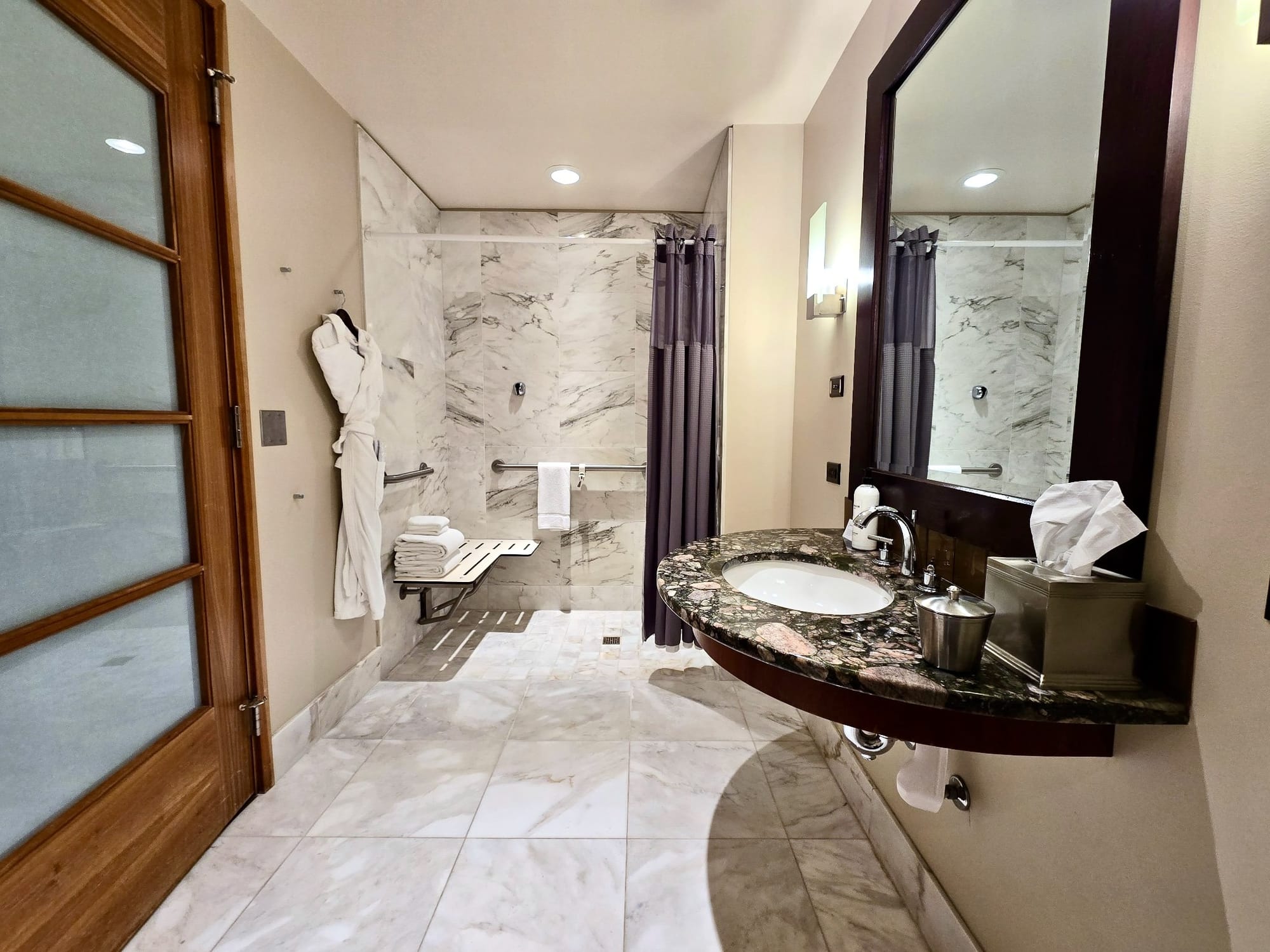 Spacious bathroom with roll-in shower at Grand Hyatt Seattle