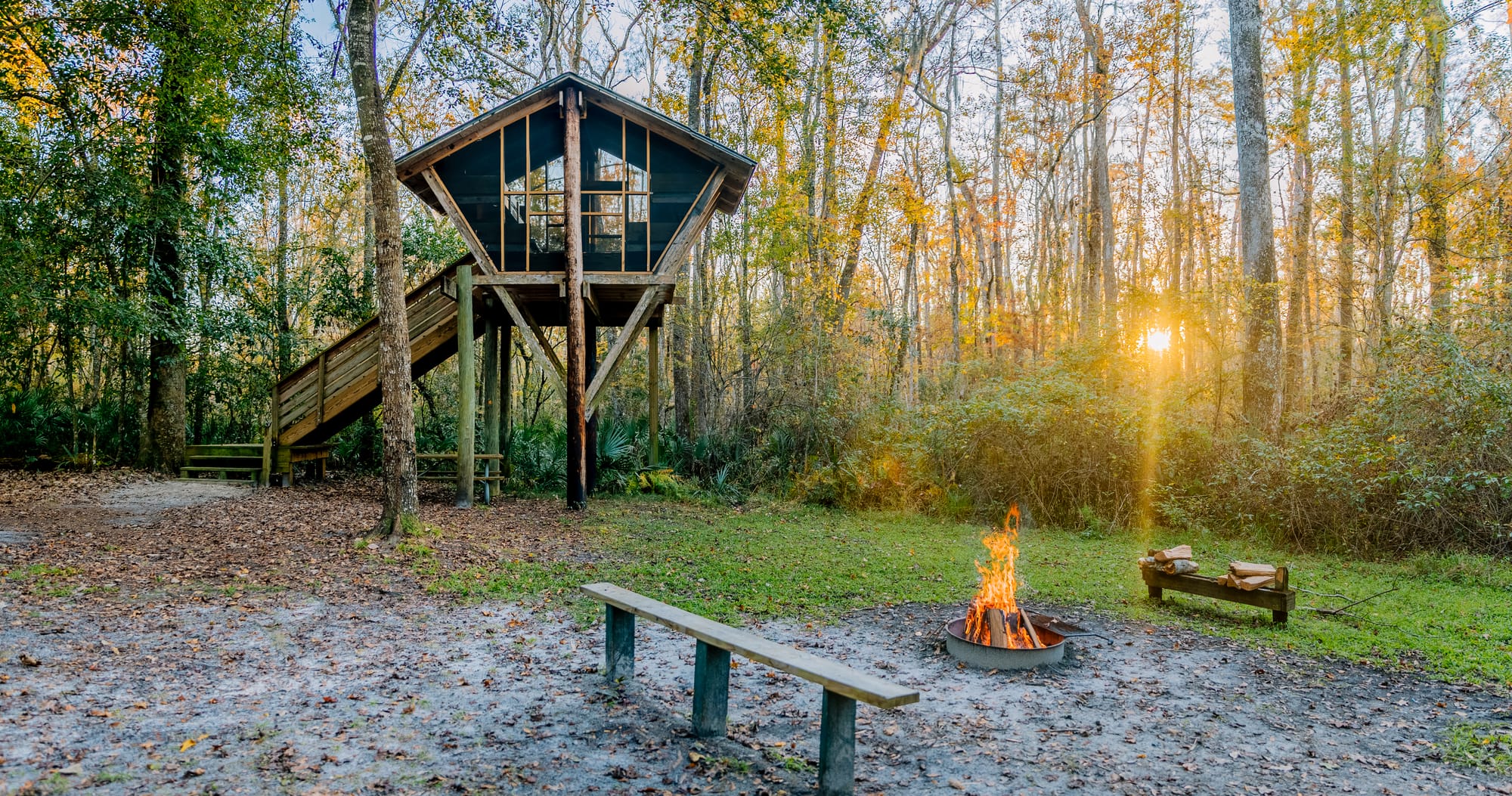 fire and treehouse at Camp Chow
