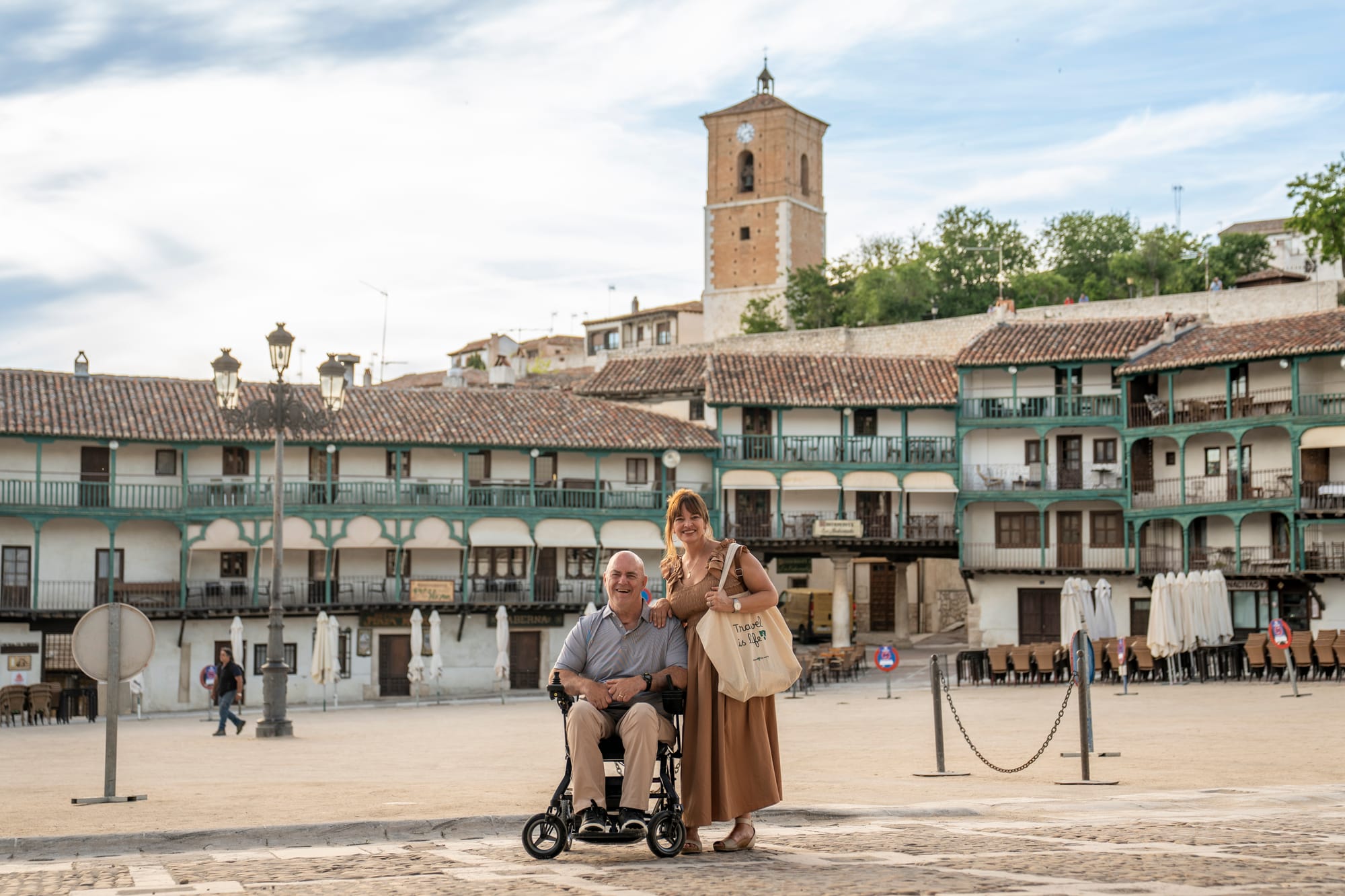 Wheelchair user and companion at