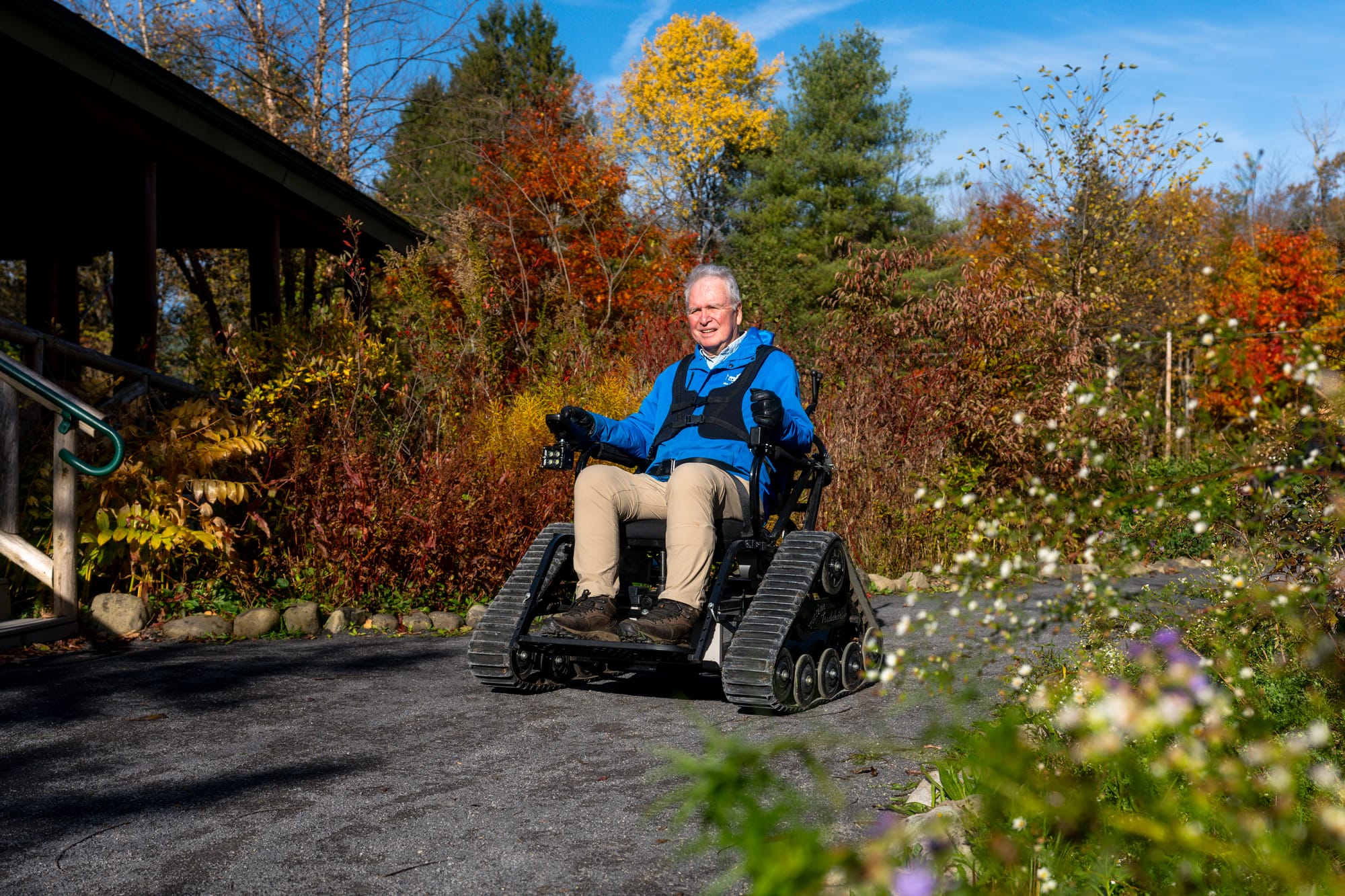 Man on a track chair at Lime Hollow Nature Center in Finger Lakes