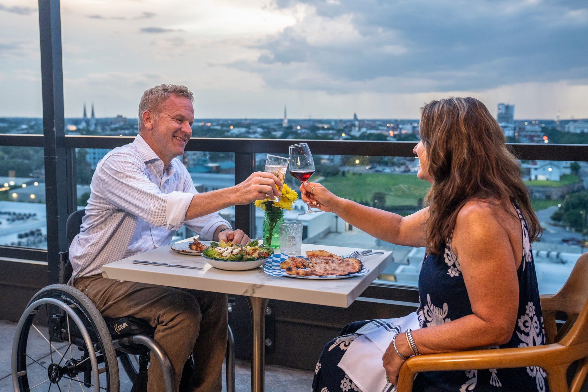 Wheelchair user and companion at an accessible restaurant in Savannah