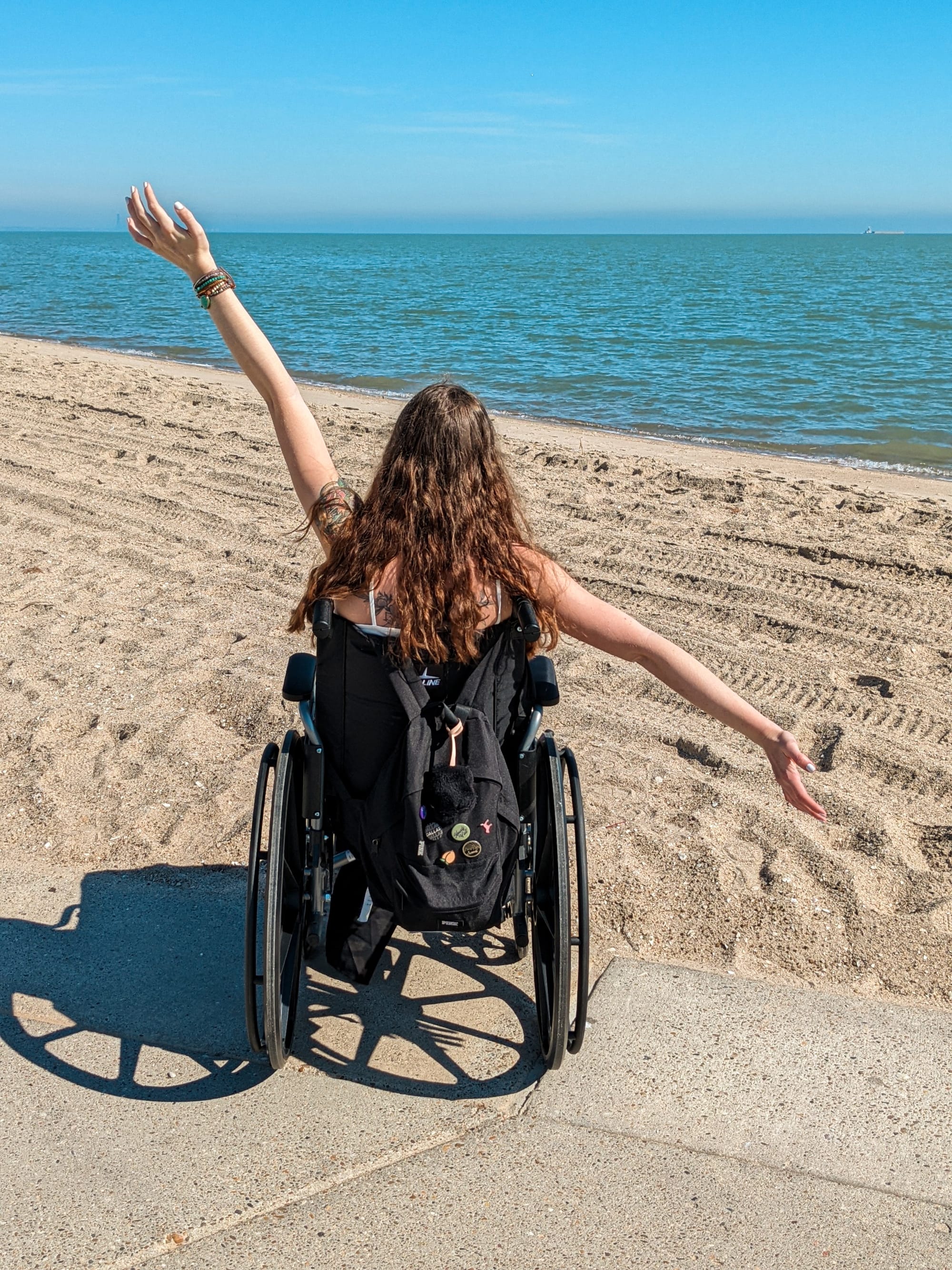 Wheelchair user looking out at ocean in Corpus Christi