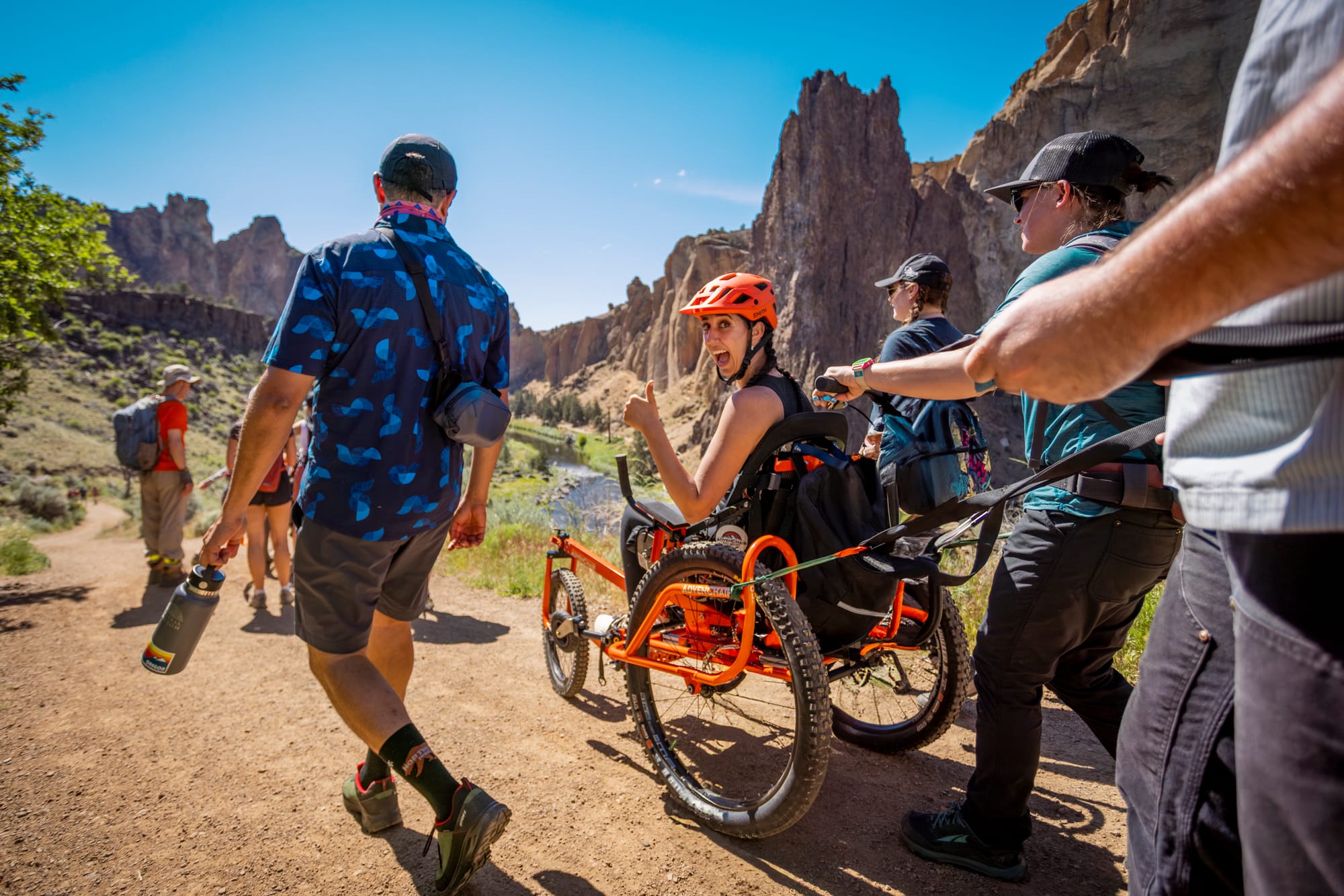 Kaylee Bays, wheelchair user, on an adapted hike at Smith Rock near Bend, Oregon