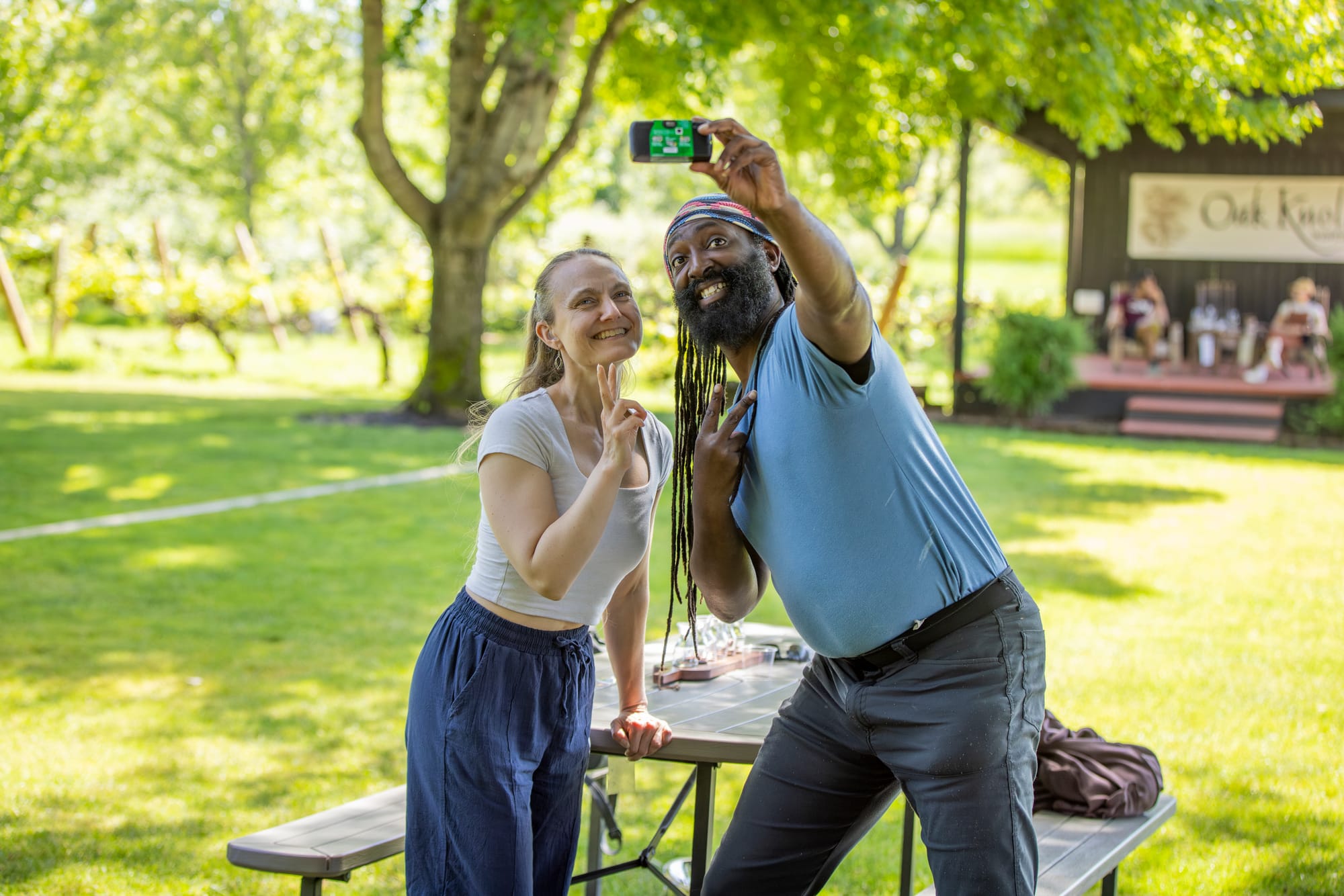 Friends taking a selfie at Oak Knoll Winery
