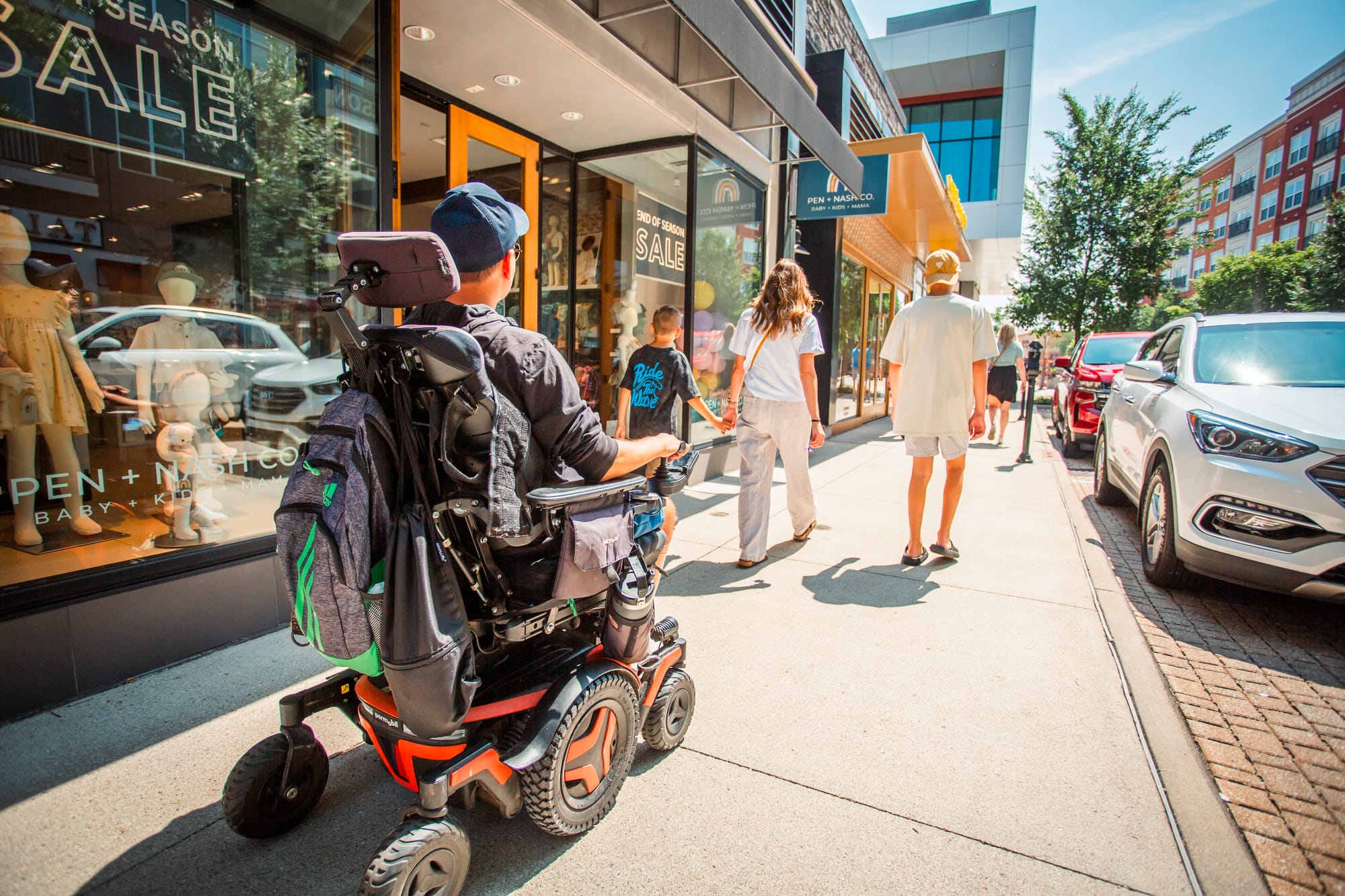 Wheelchair user and family exploring Liberty Center in Butler County