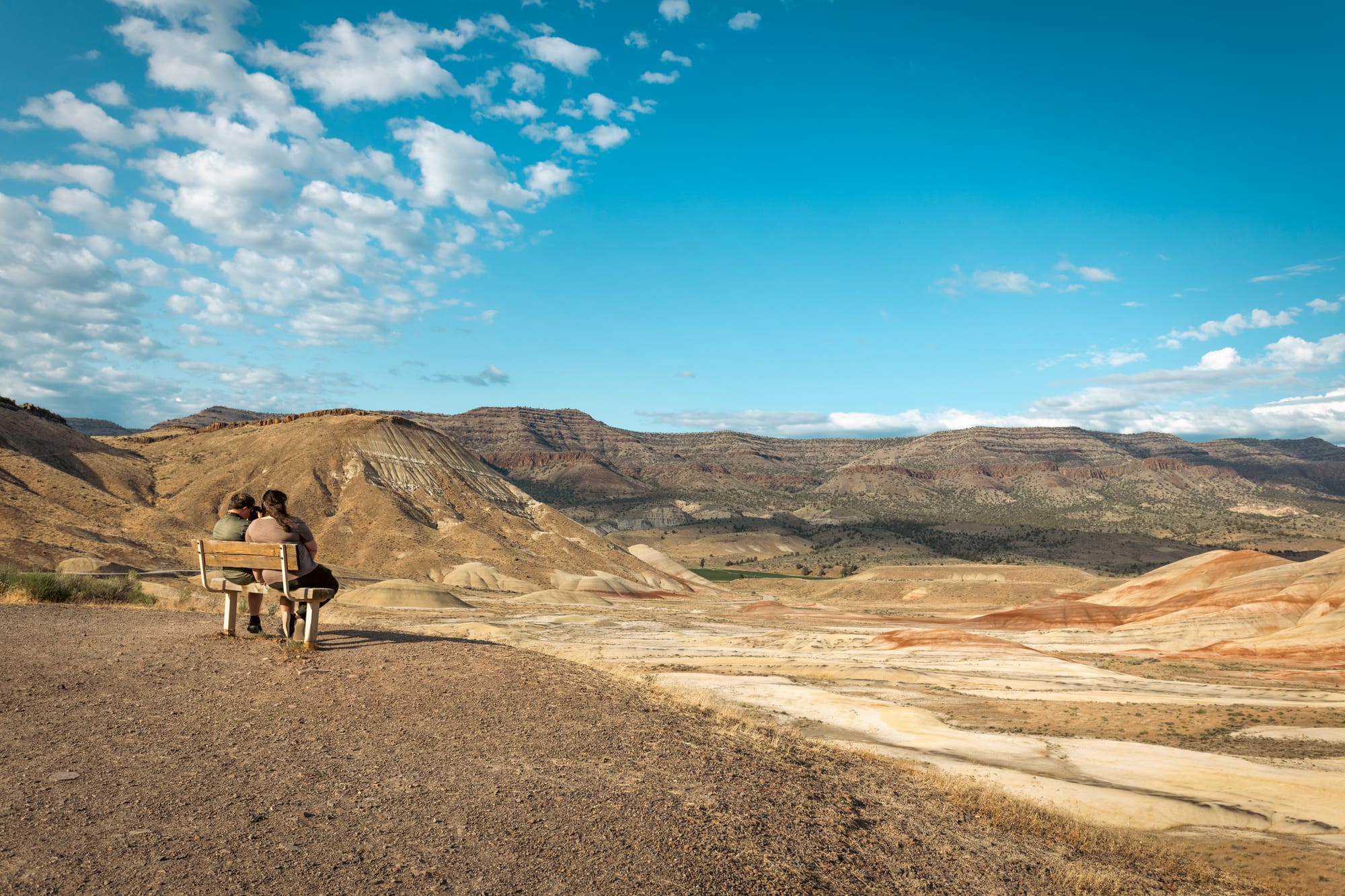 Sitting at a lookout bench in Painted Hills