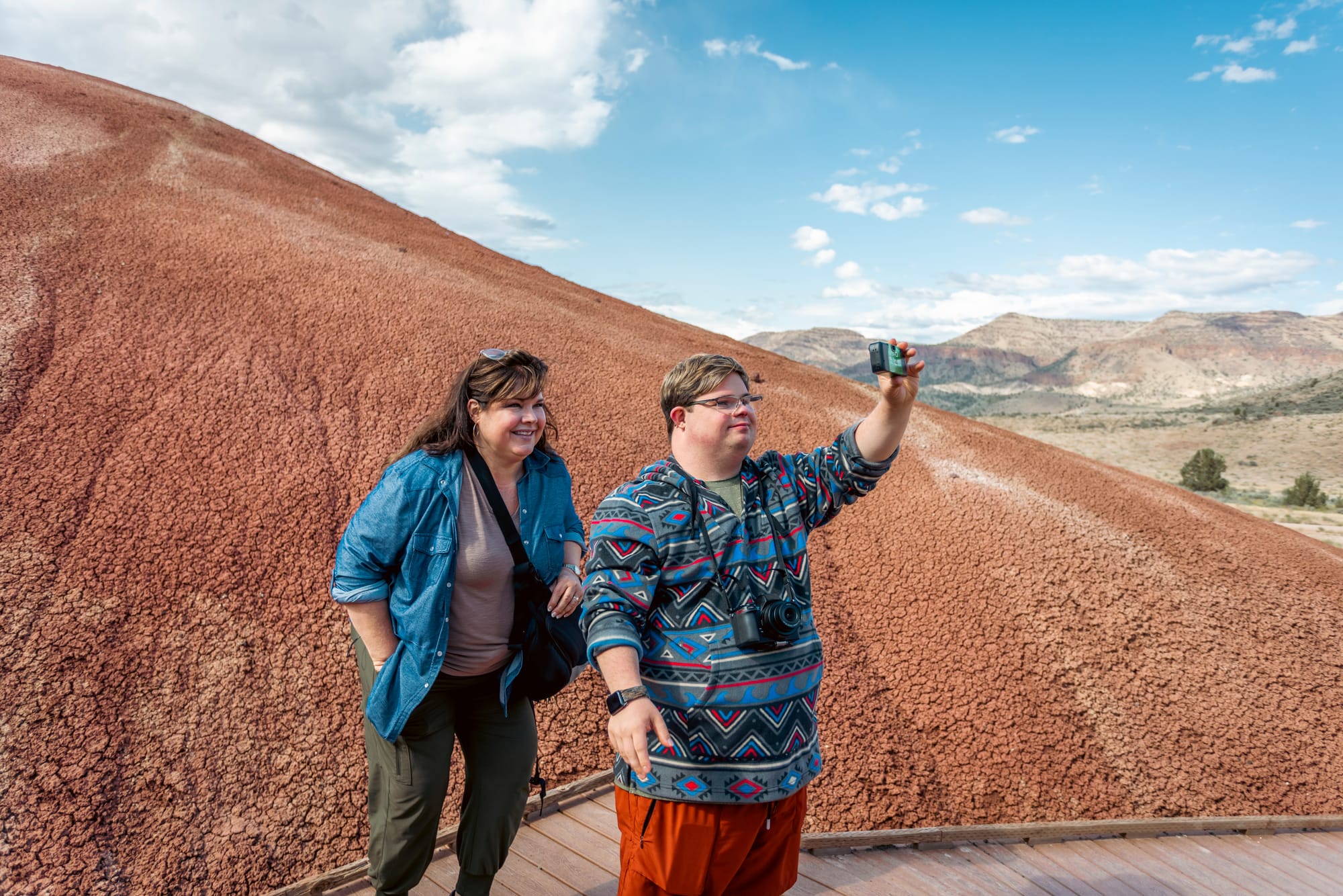 Houston, man with down syndrome, taking a selfie with him and companion at Painted Hills