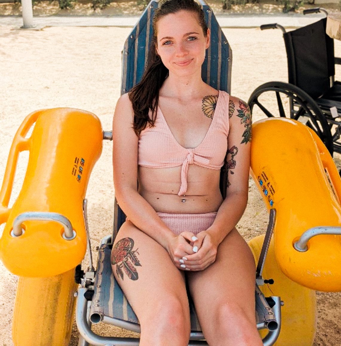 Woman in beach wheelchair in Corpus Christi