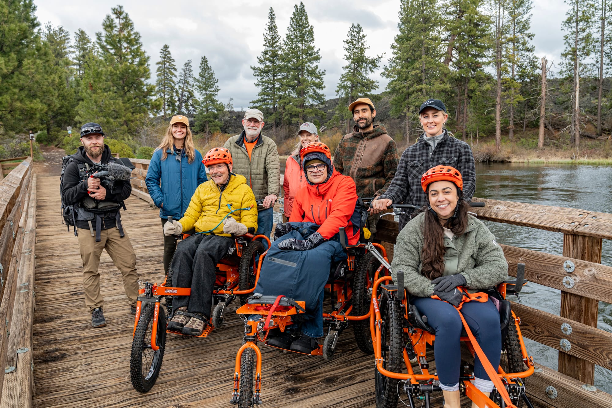 Wheelchair users using Advenchair track chairs for adaptive trekking in Bend