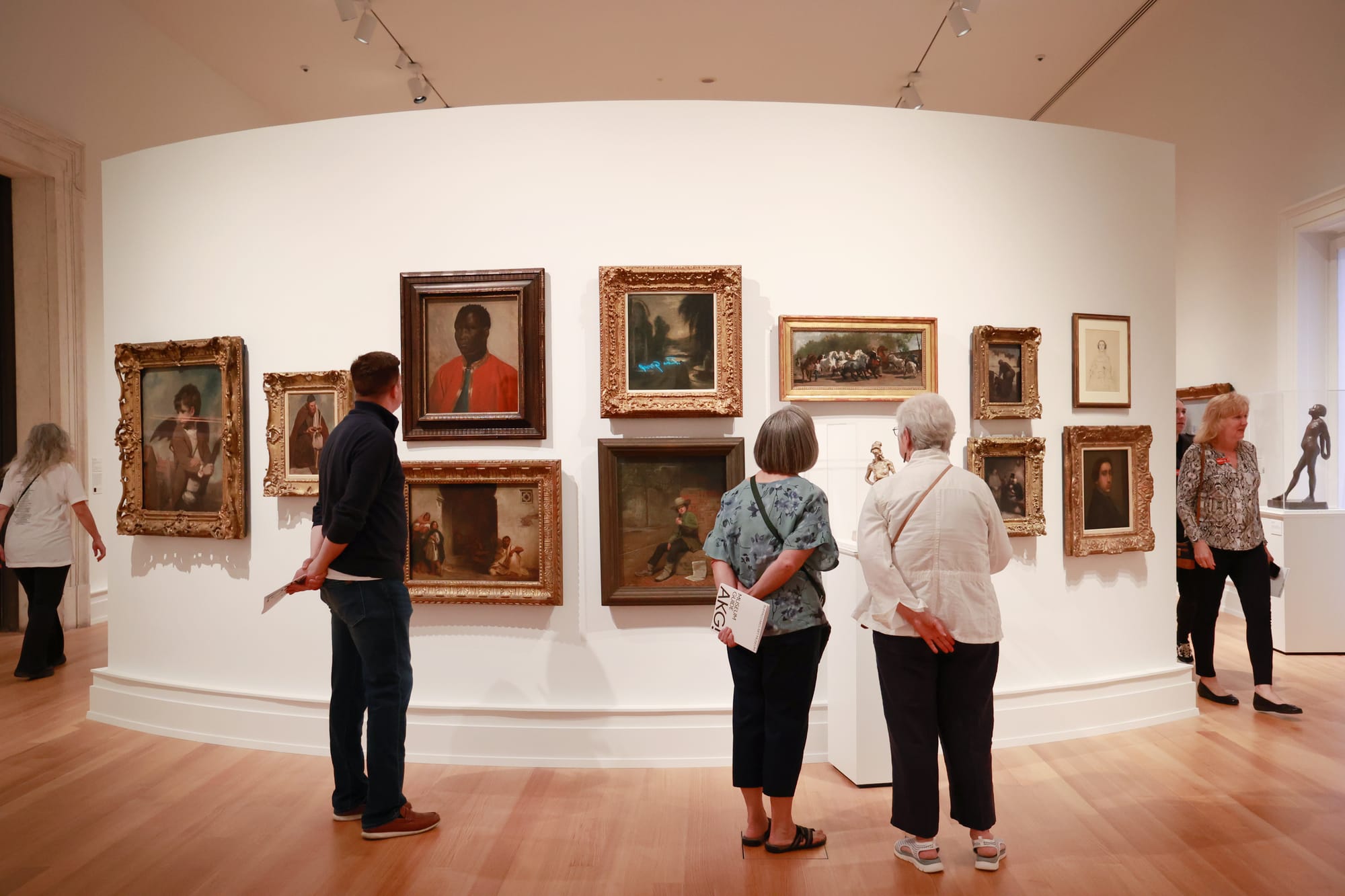 People looking at art in Buffalo AKG Art Museum