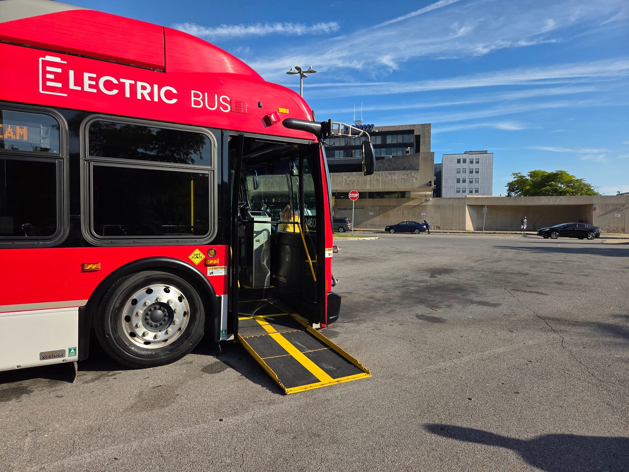 A wheelchair ramp onto a red NFTA Metro Bus