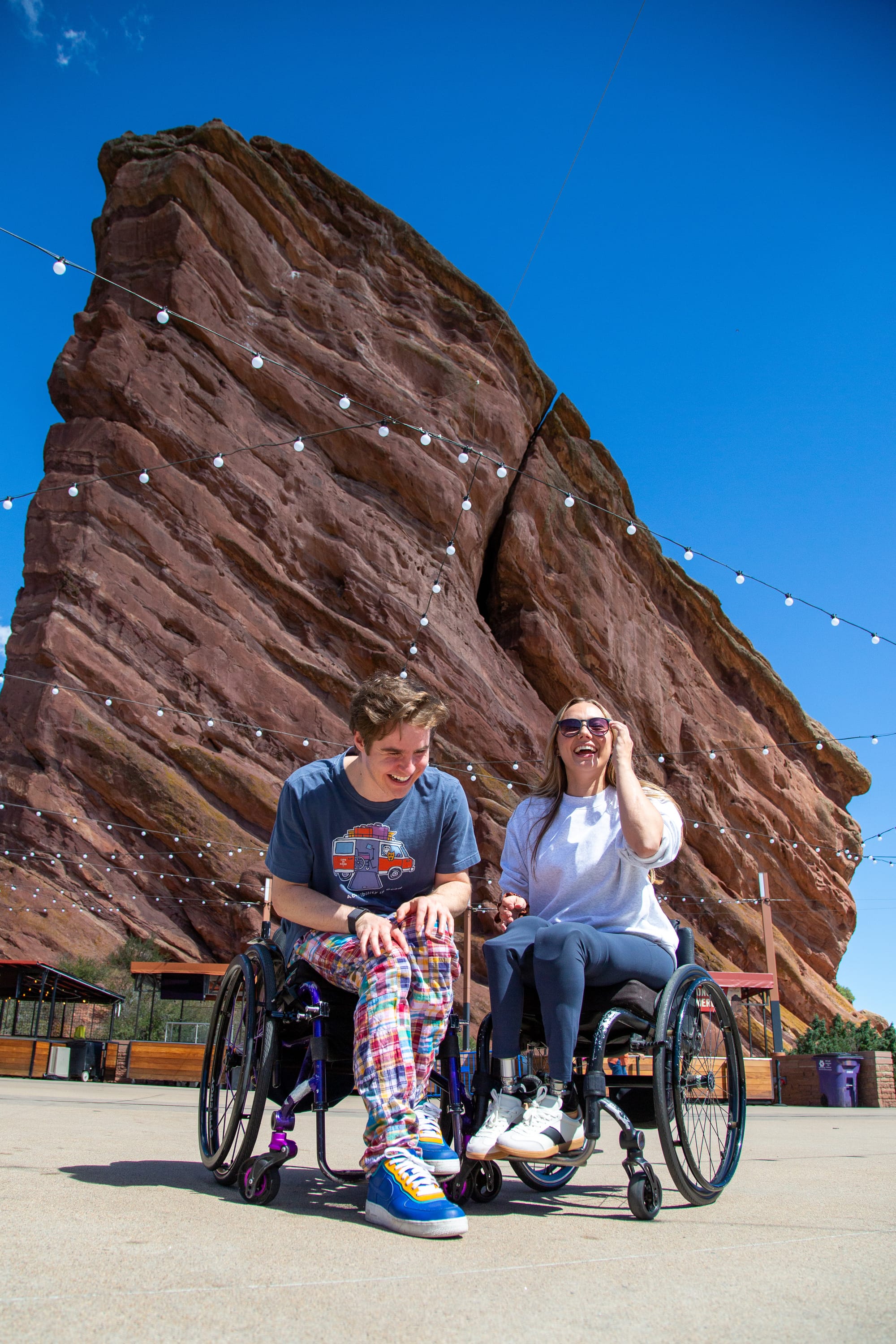 Mason Branstrator and Stefanie Schafer, both wheelchair users, at Red Rocks Park & Amphitheatre near Denver