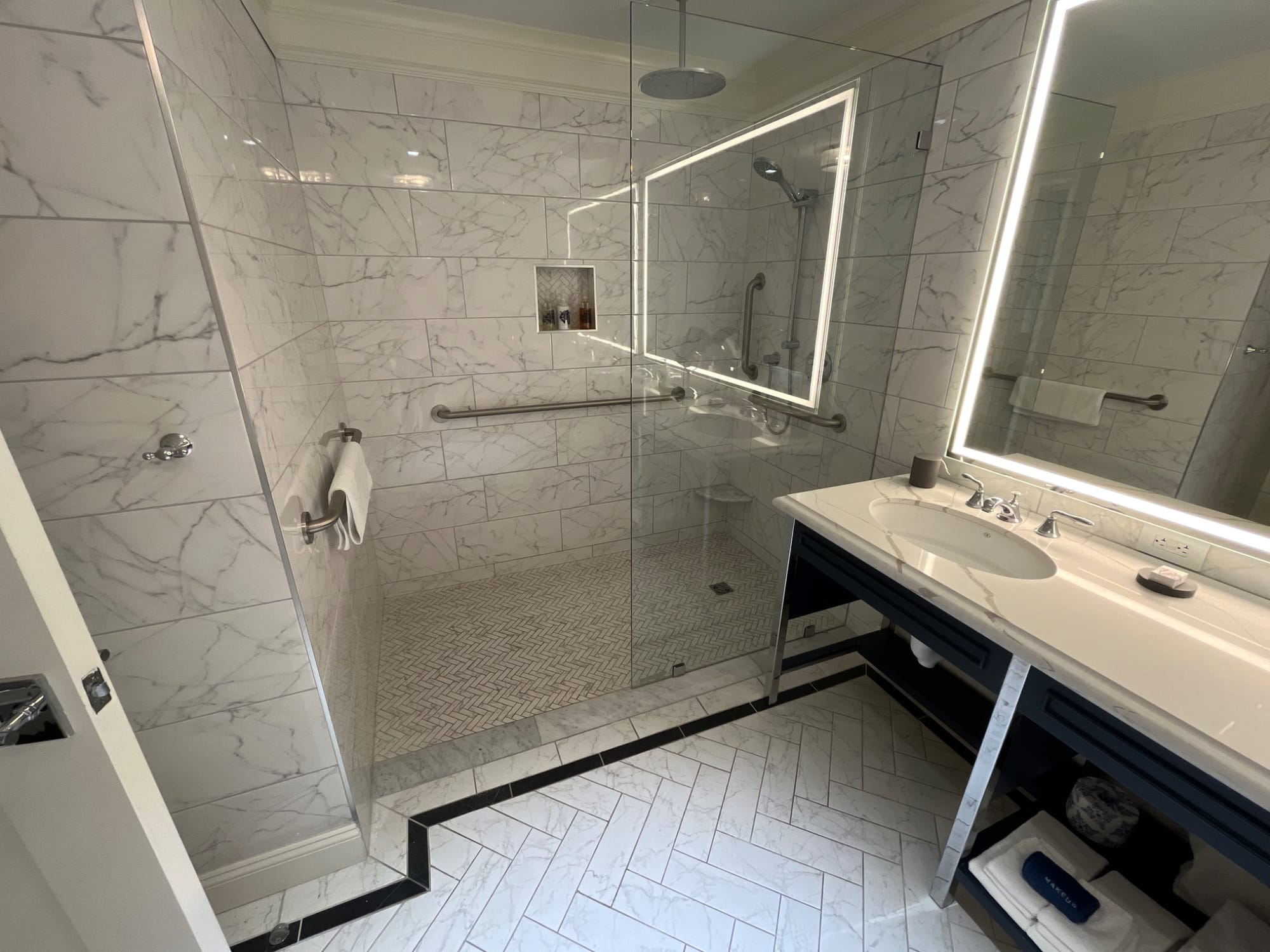 Roll-in shower and grab bars at The Adelphi Hotel