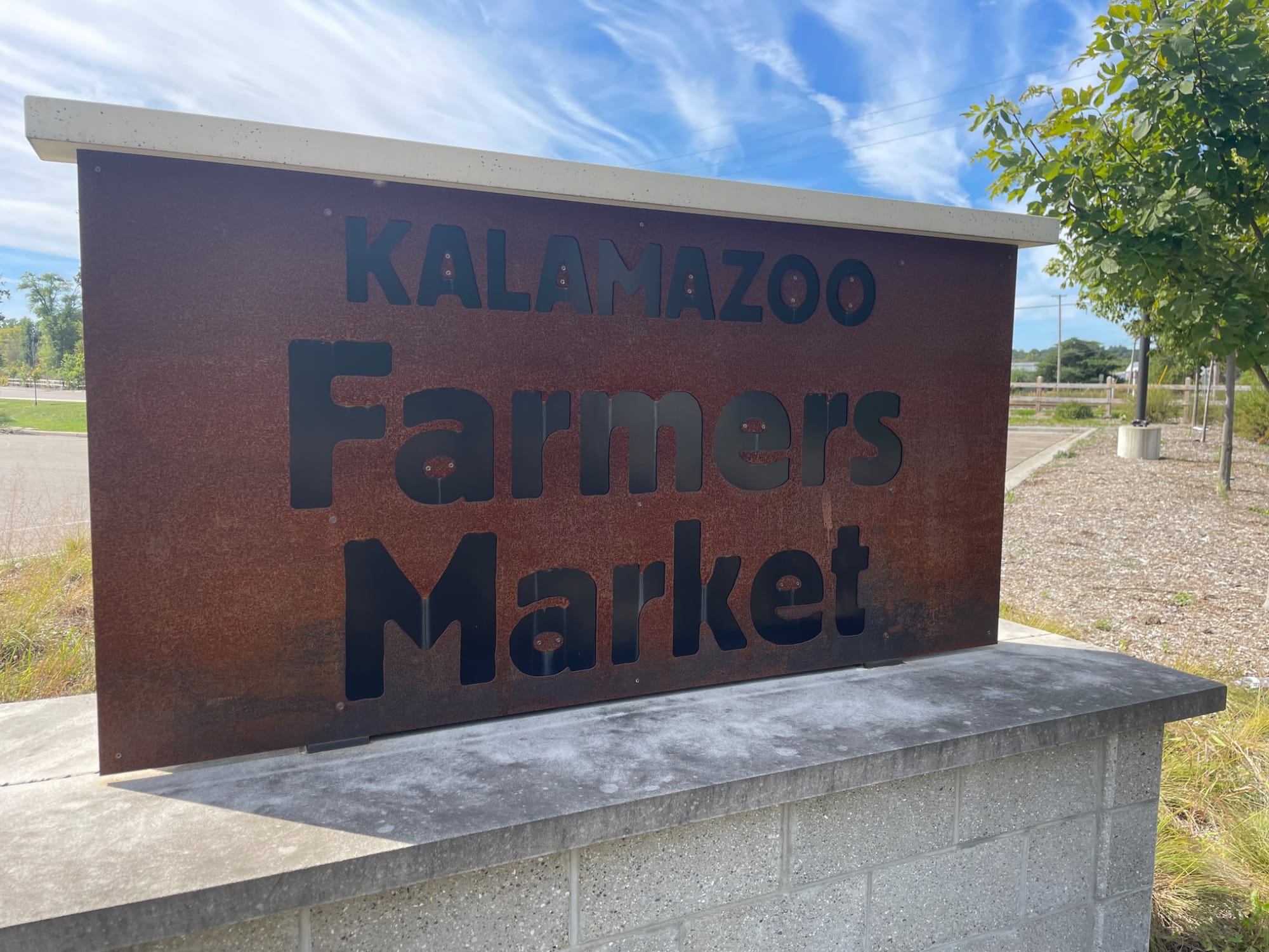 Sign reading "Kalamazoo Farmers Market"