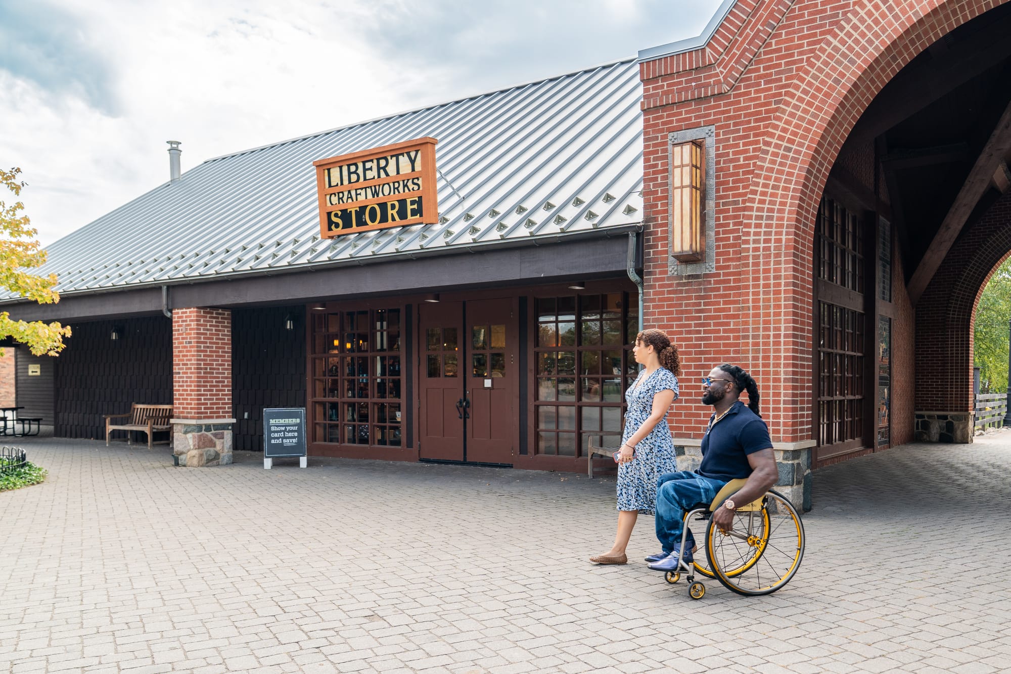 Wheelchair user, Matt Scott, exploring Detroit with a guide
