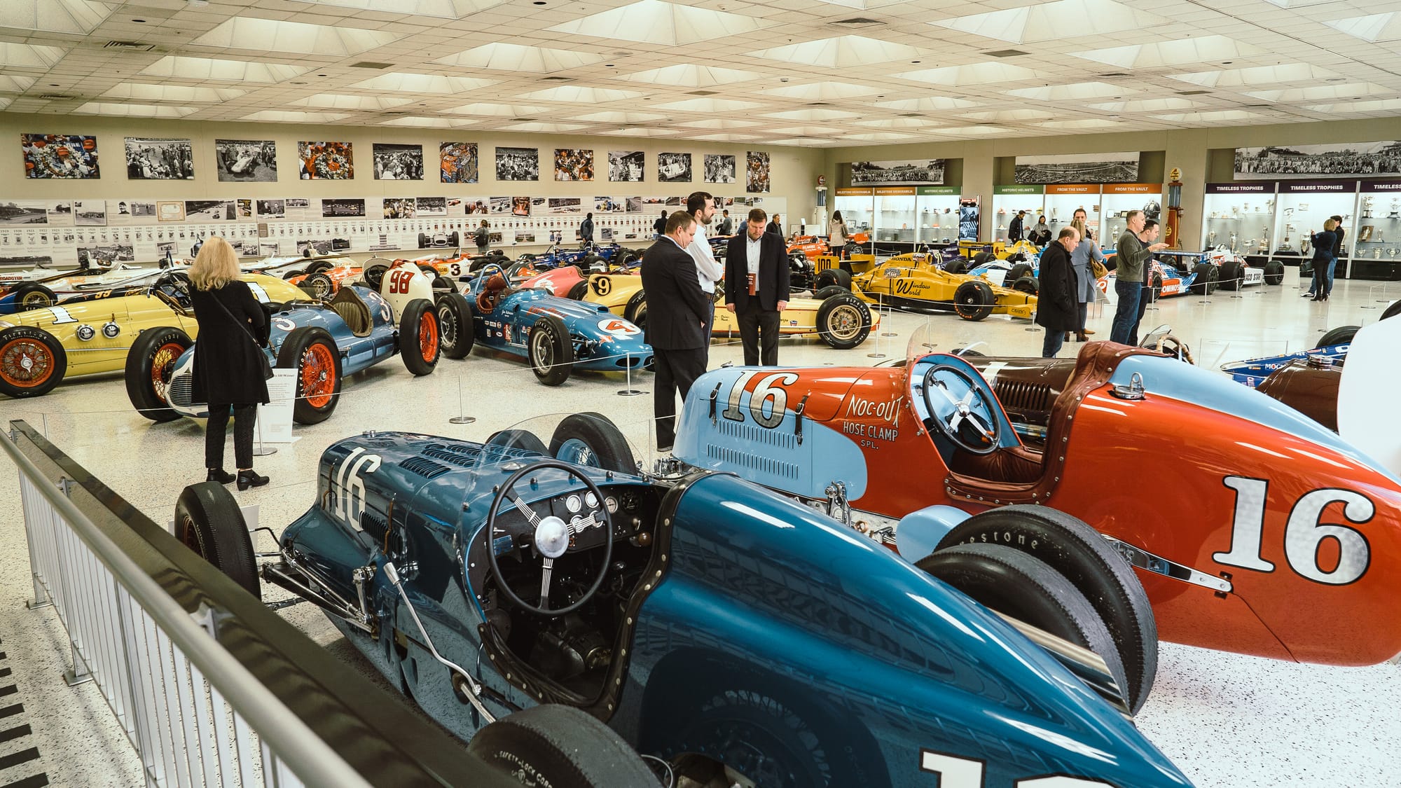 People looking at old cars at Indianapolis Motor Speedway Museum