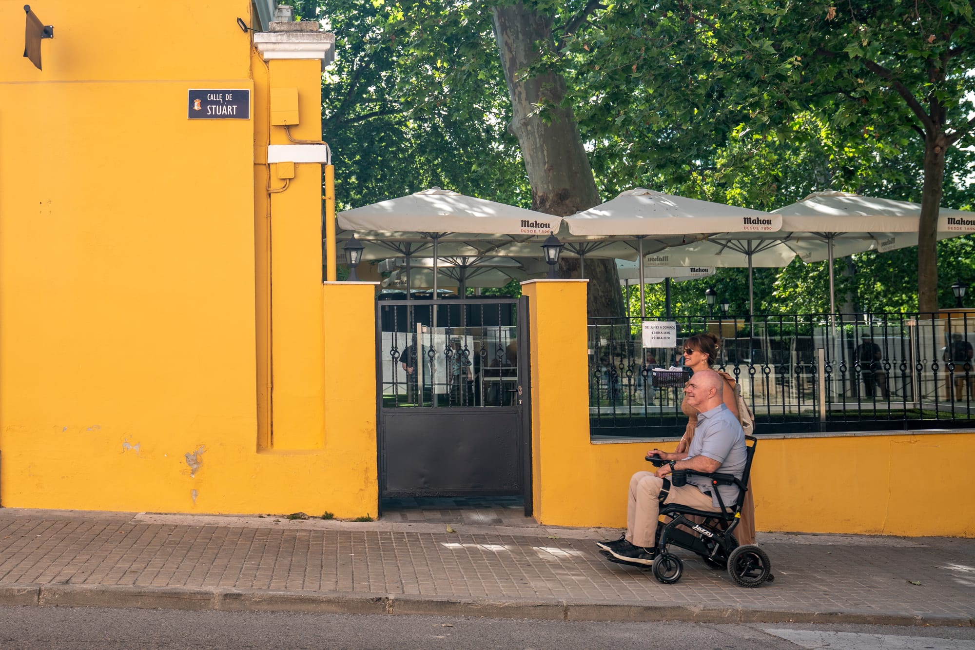 Bert, wheelchair user, traveling with his wife Joy in Spain