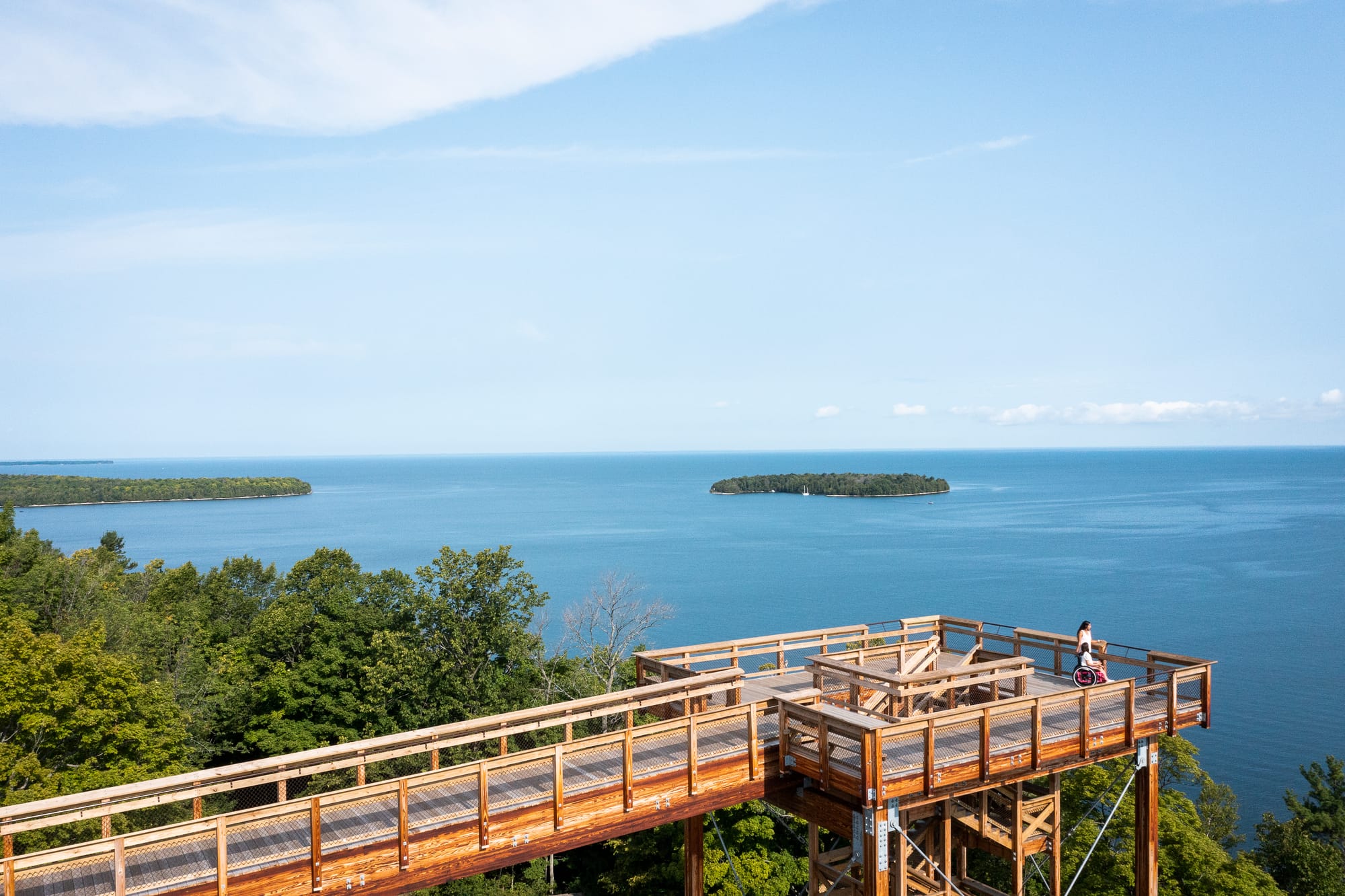 Aerial view of Eagle Tower with wheelchair user and mom