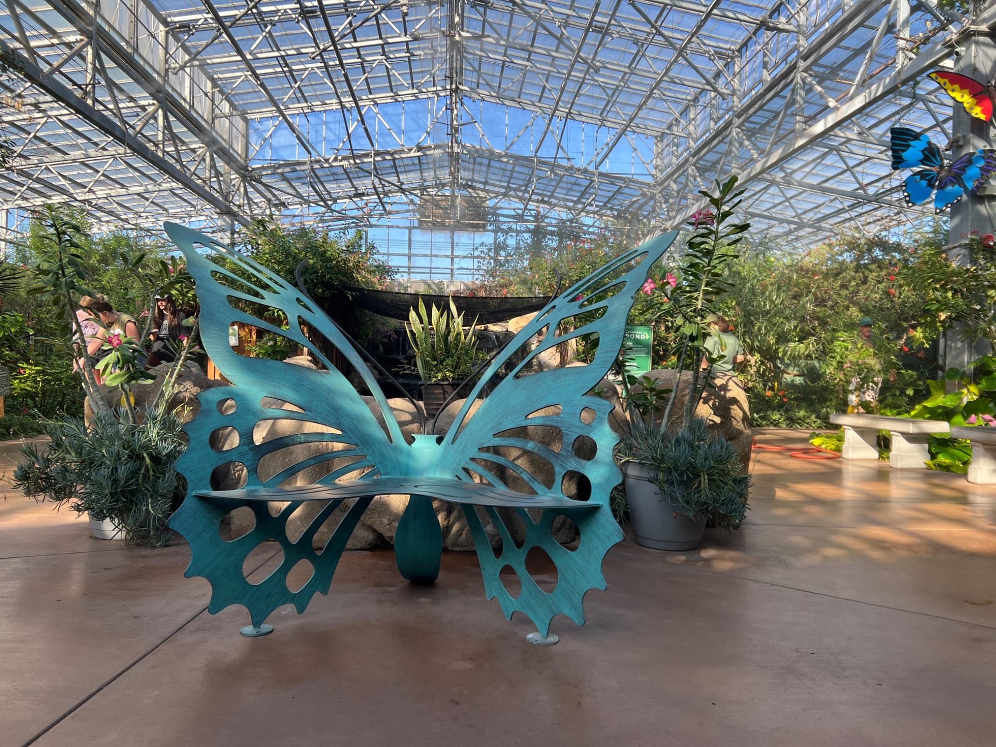 Massive butterfly sculpture and foliage at Butterfly Wonderland