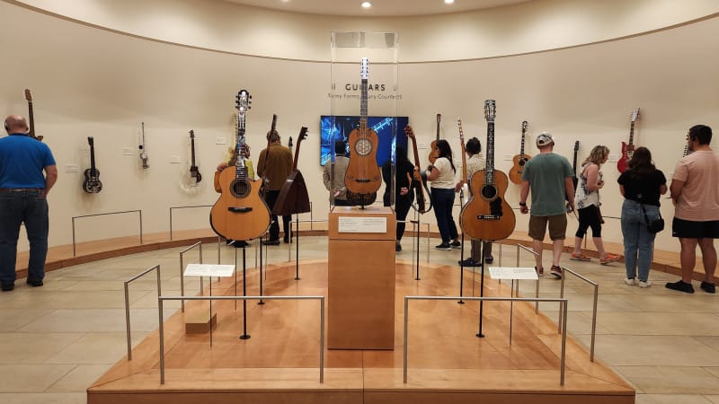 People looking at instruments at Musical Instrument Museum