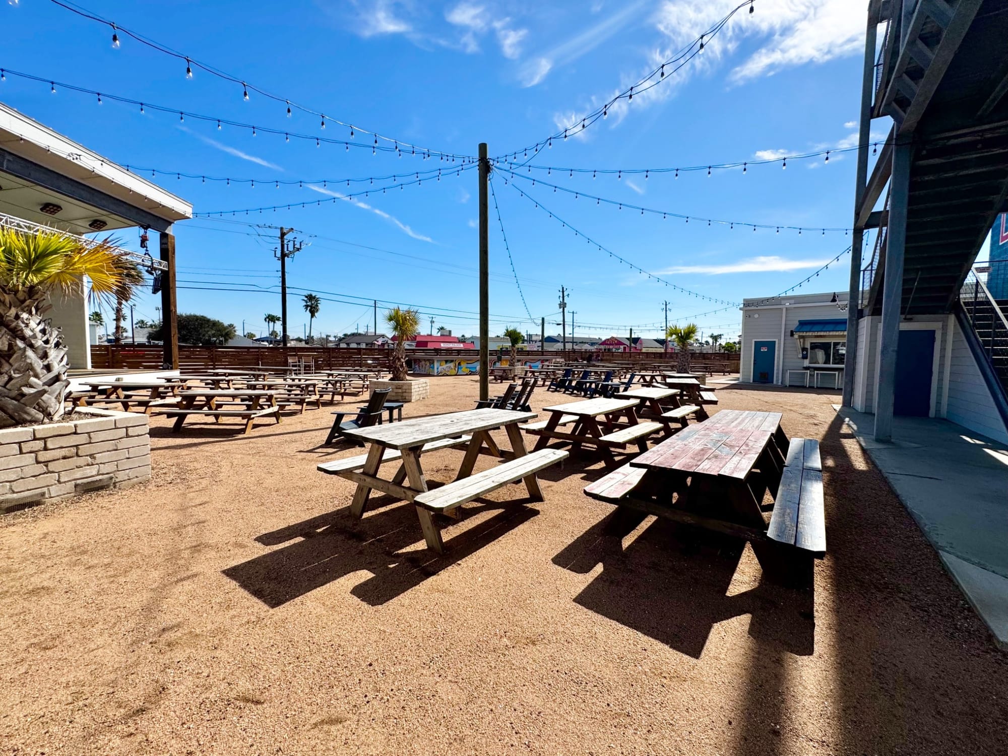 Outdoor yard with benches at Sip Yard