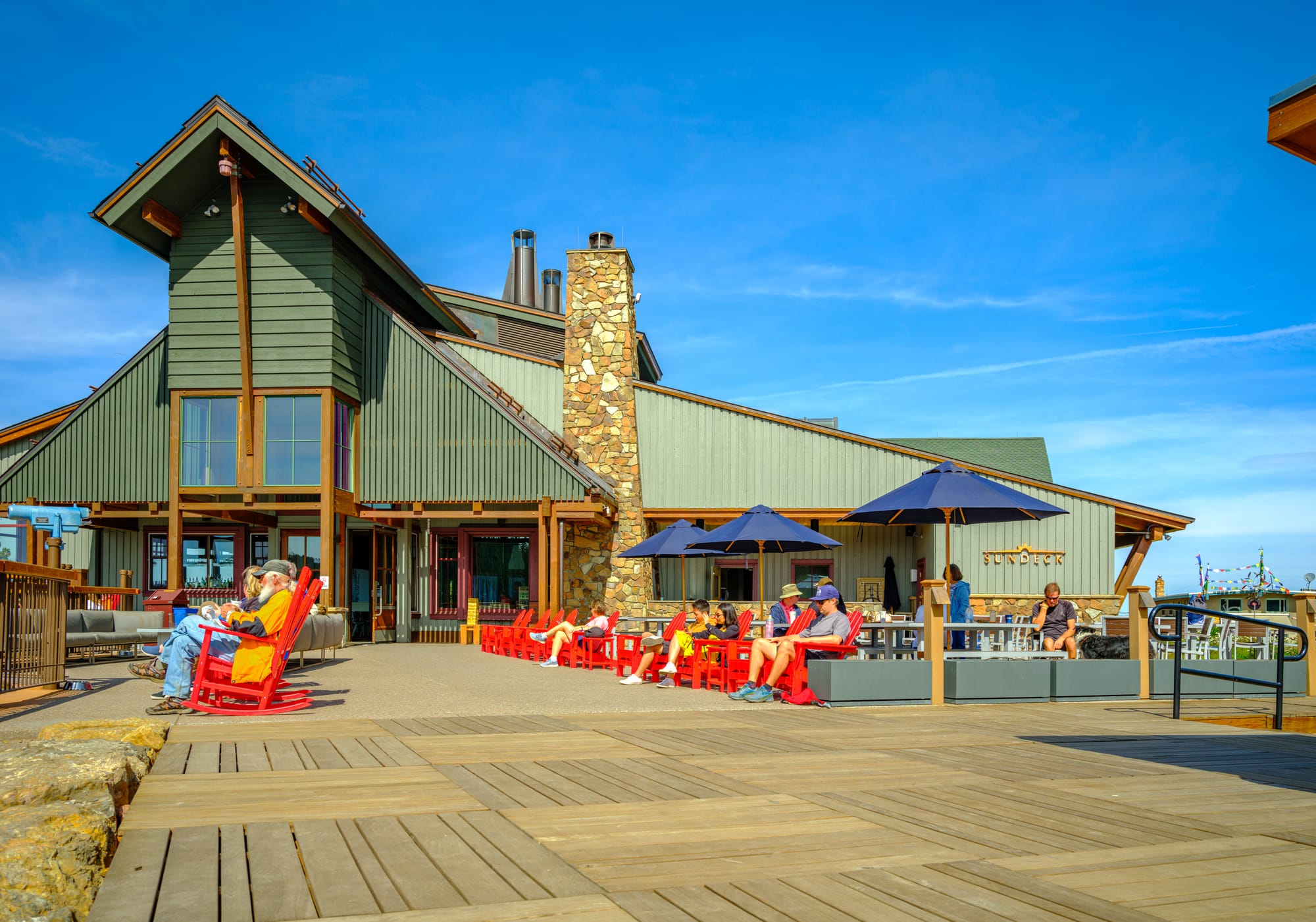 People sitting outside at the ski resort in Aspen on a nice sunny day