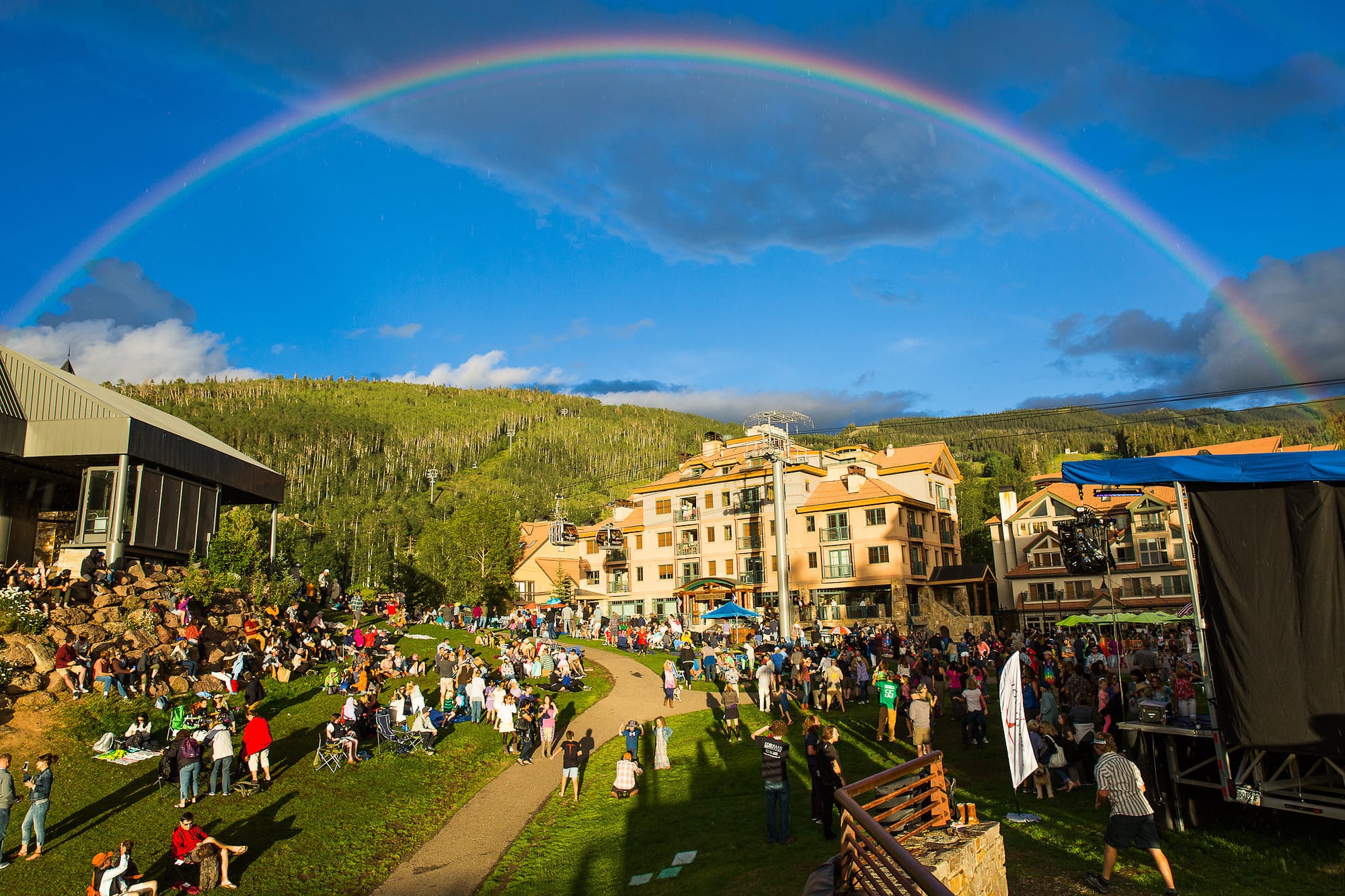 Sunset Plaza in Telluride with rainbow over the mountains