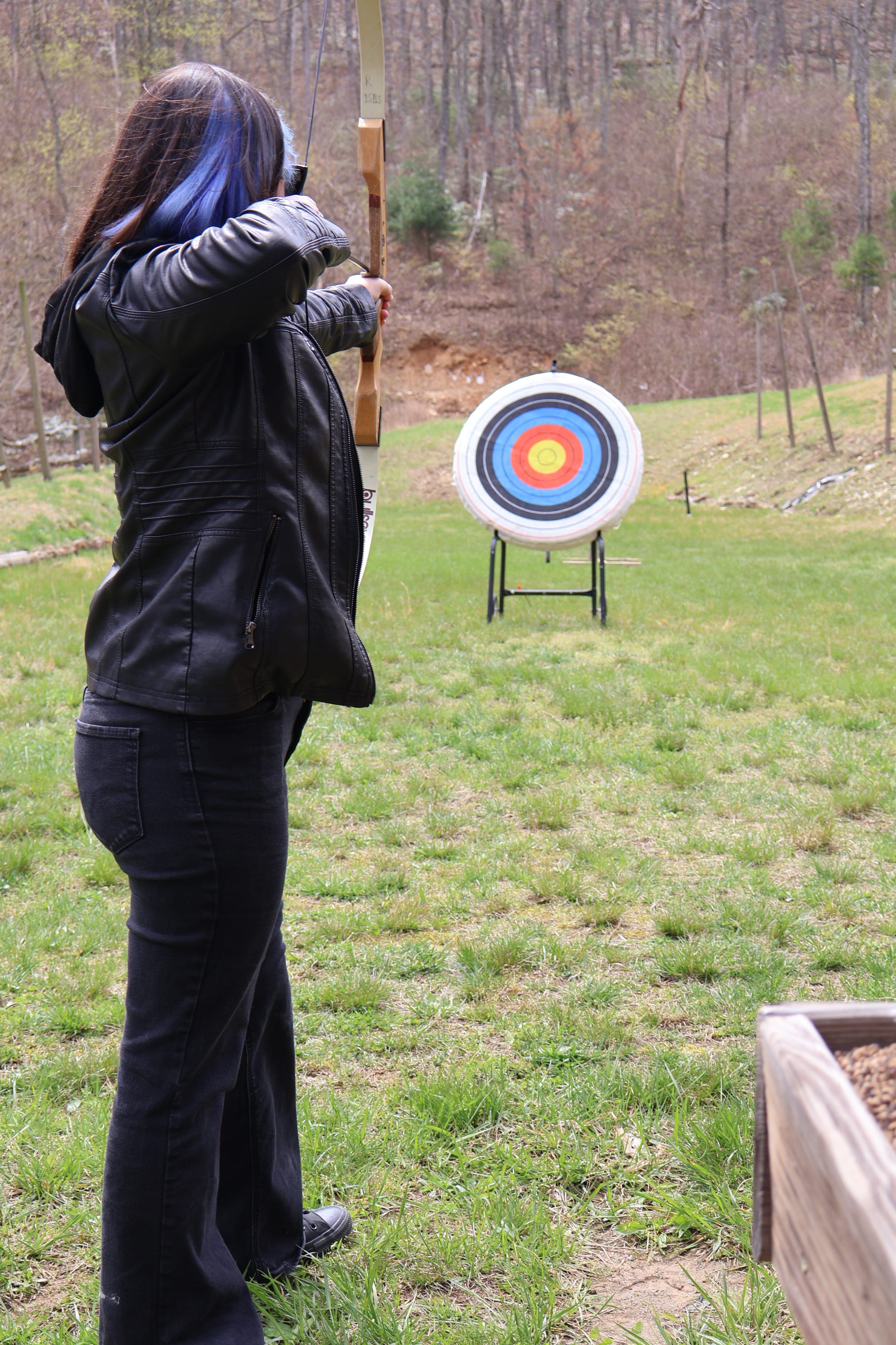 Amputee woman trying archery in Blowing Rock, North Carolina
