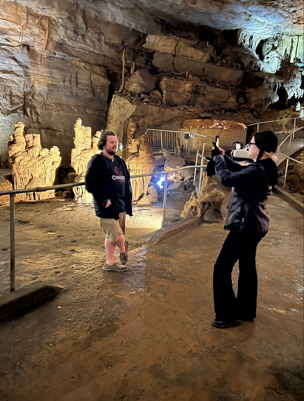 Woman taking a photo at Cathedral Caverns State Park