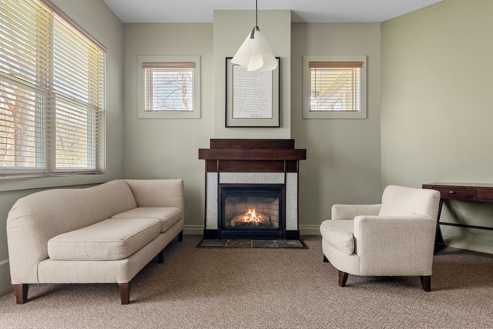 Living room with couch and fireplace at Emerson Resort and Spa