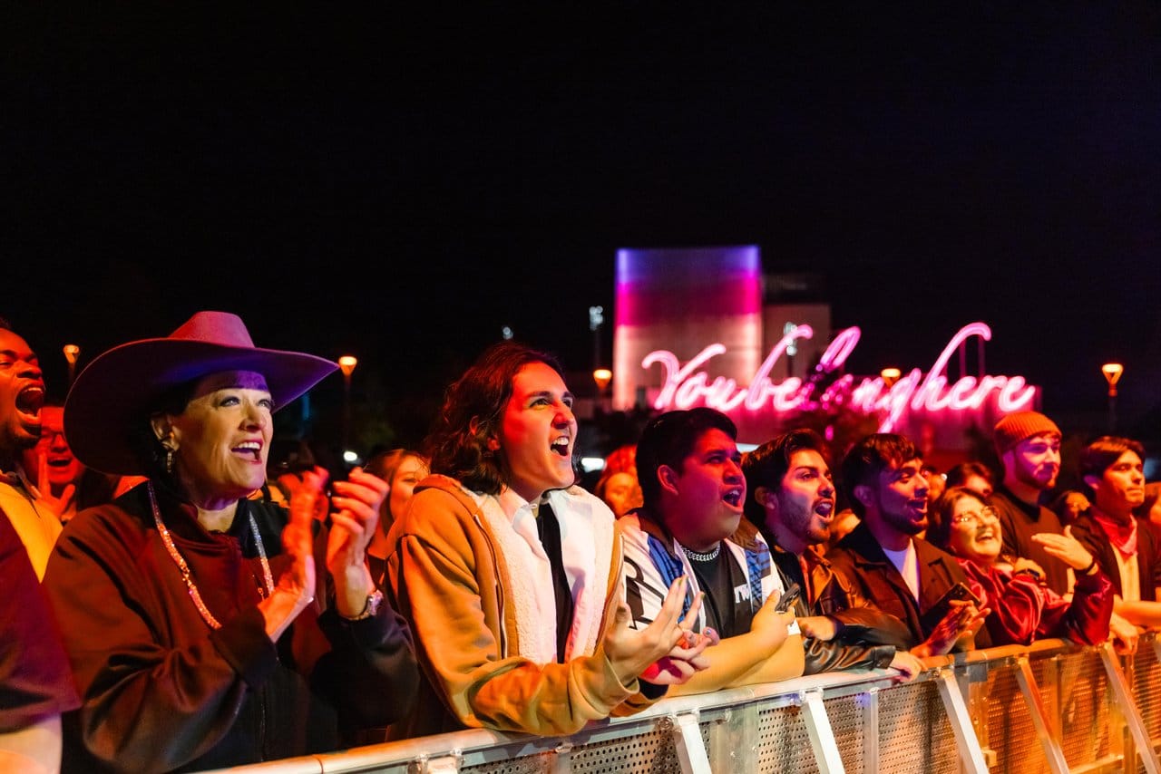 People singing and enjoying a concert at The Momentary