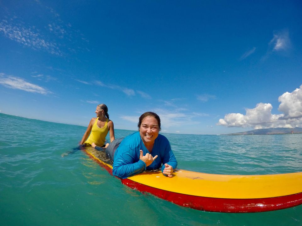 Wheelchair user enjoying adapted and accessible surfing in Maui, Hawaii