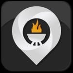 The logo for The Cookout: white circle with a small grill in the middle.