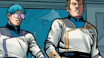 Max Sterling with short blue hair. Next to him is Ben Dixon, slightly more on-model.